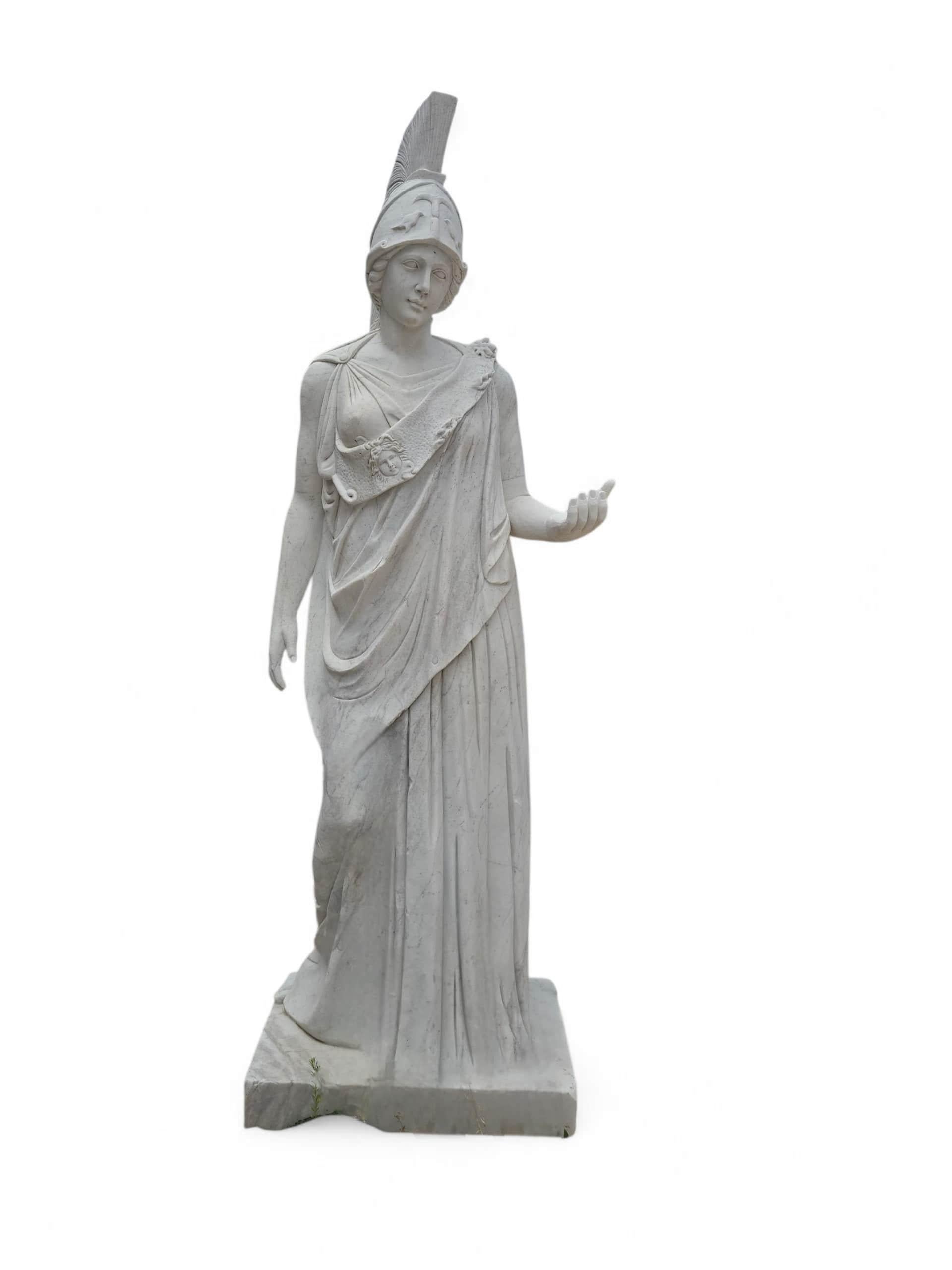 Exceptional pair of monumental marble sculptures depicting the Greek goddess Minerva (Athena), crafted in Italy during the 1950s from fine white Italian marble. Each figure is portrayed in full classical attire, complete with helmet, draped robes,