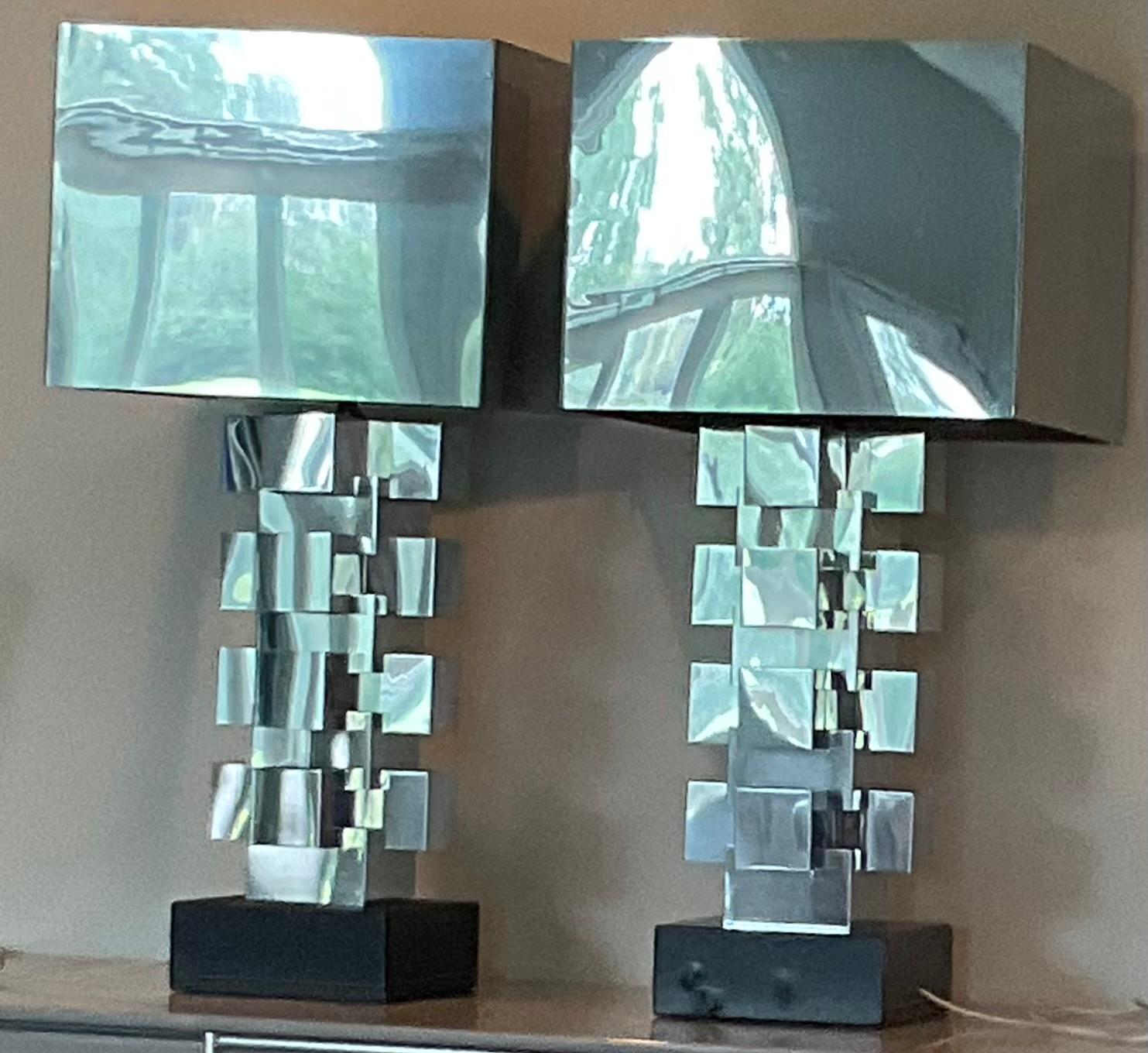MONUMENTAL Pair of Curtis Jere Skyscraper Lamps in Chrome with Original chrome shades. Signed with original plaque. These lamps are monumental in person and light within the lamp, as well as, in the harp. 