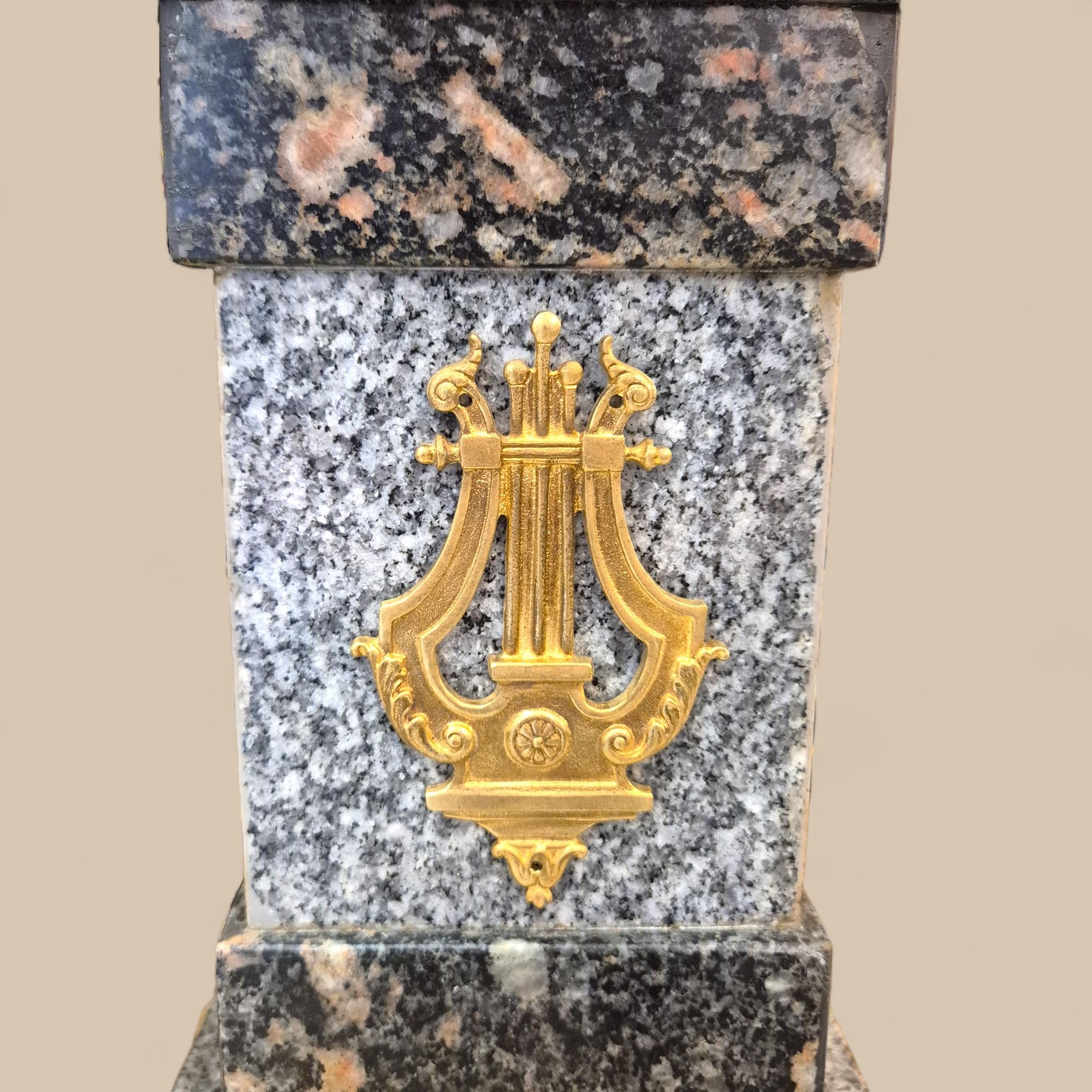 Carved Monumental pair of Empire style porphyry and bronze obelisks, 19th century For Sale