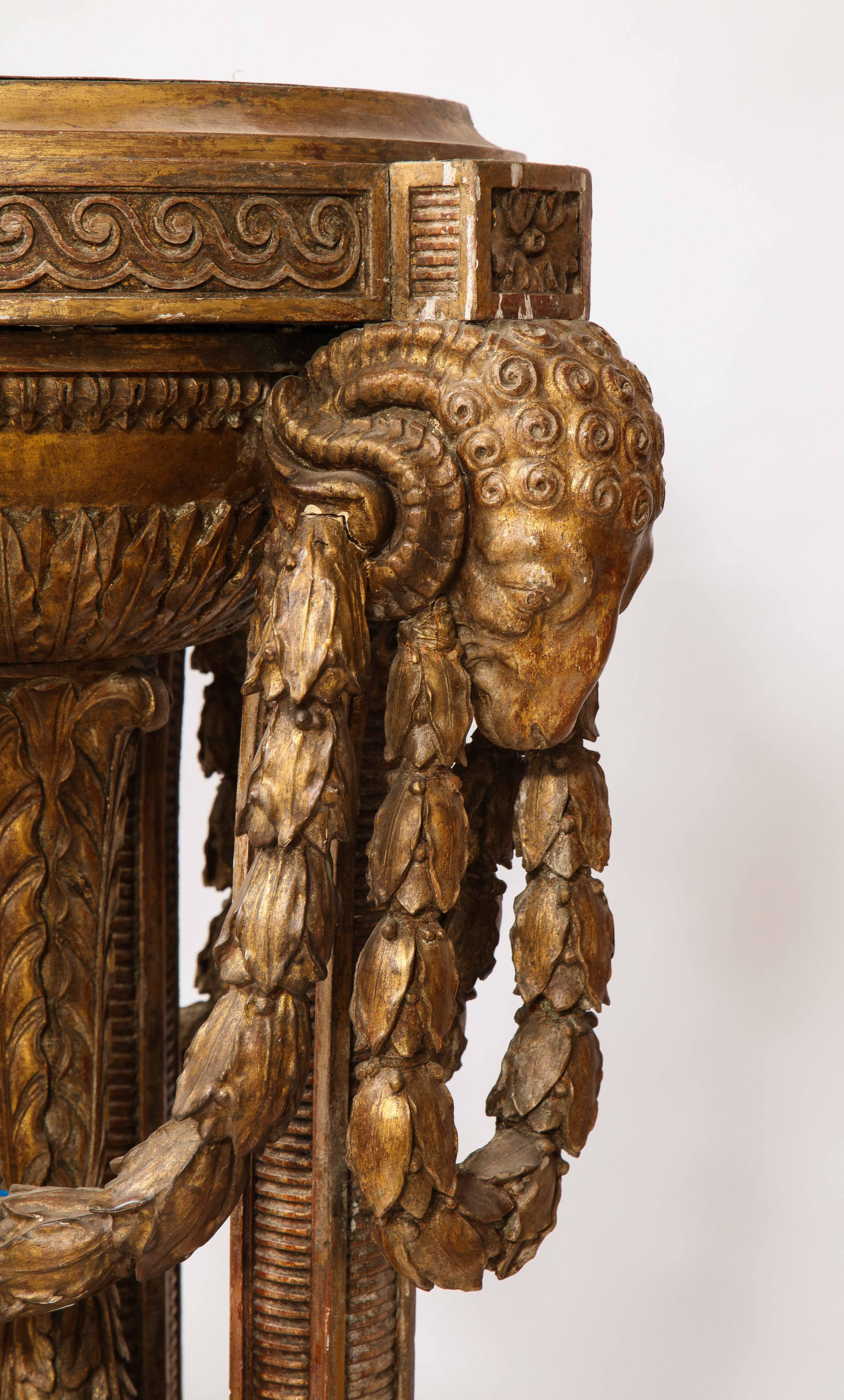 Monumental Pair of English Giltwood Torcheres w/ Rams Heads, Laurels, & Swags In Fair Condition For Sale In New York, NY