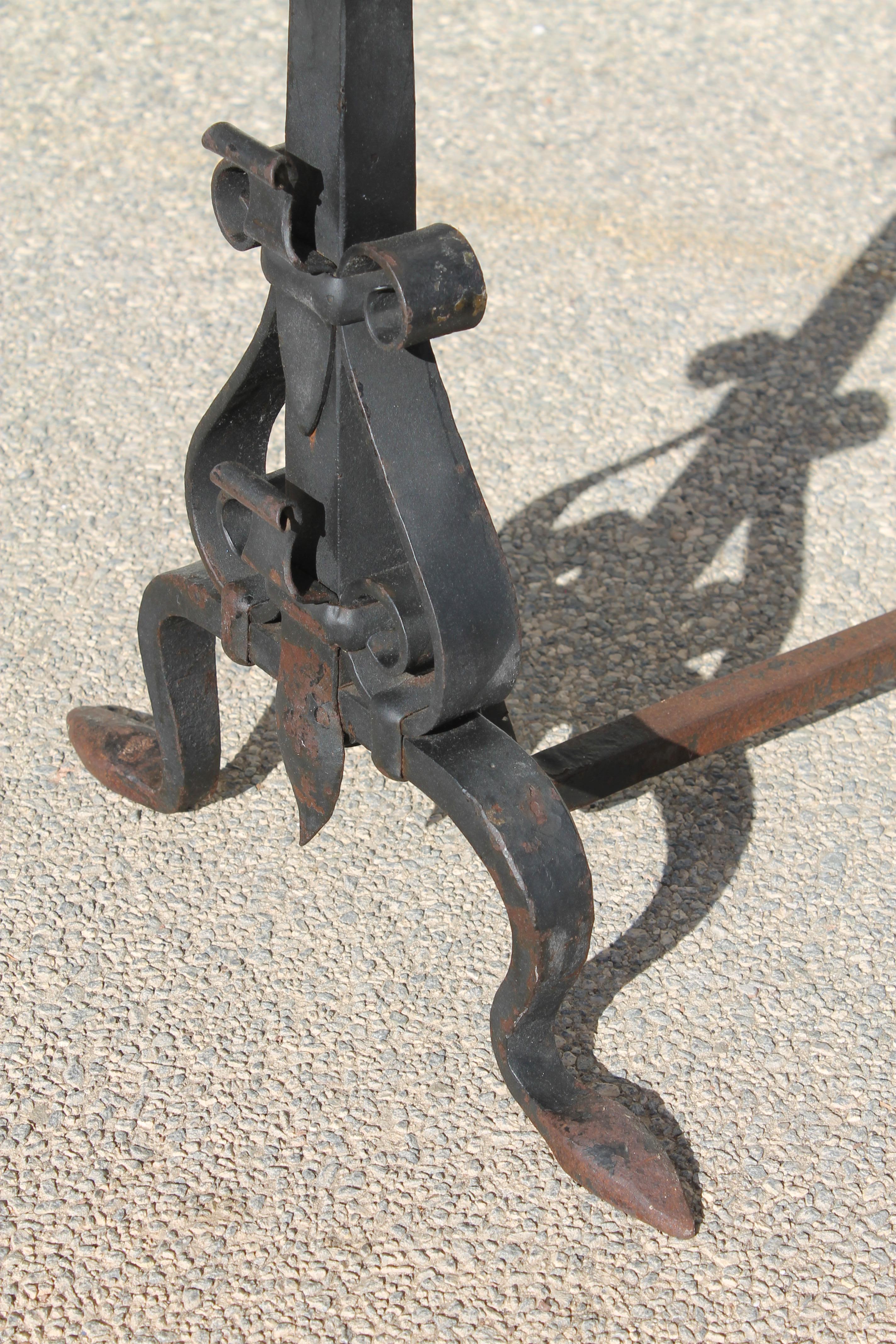 Early 20th Century Monumental Pair of Forged Iron Spanish Revival Andirons For Sale