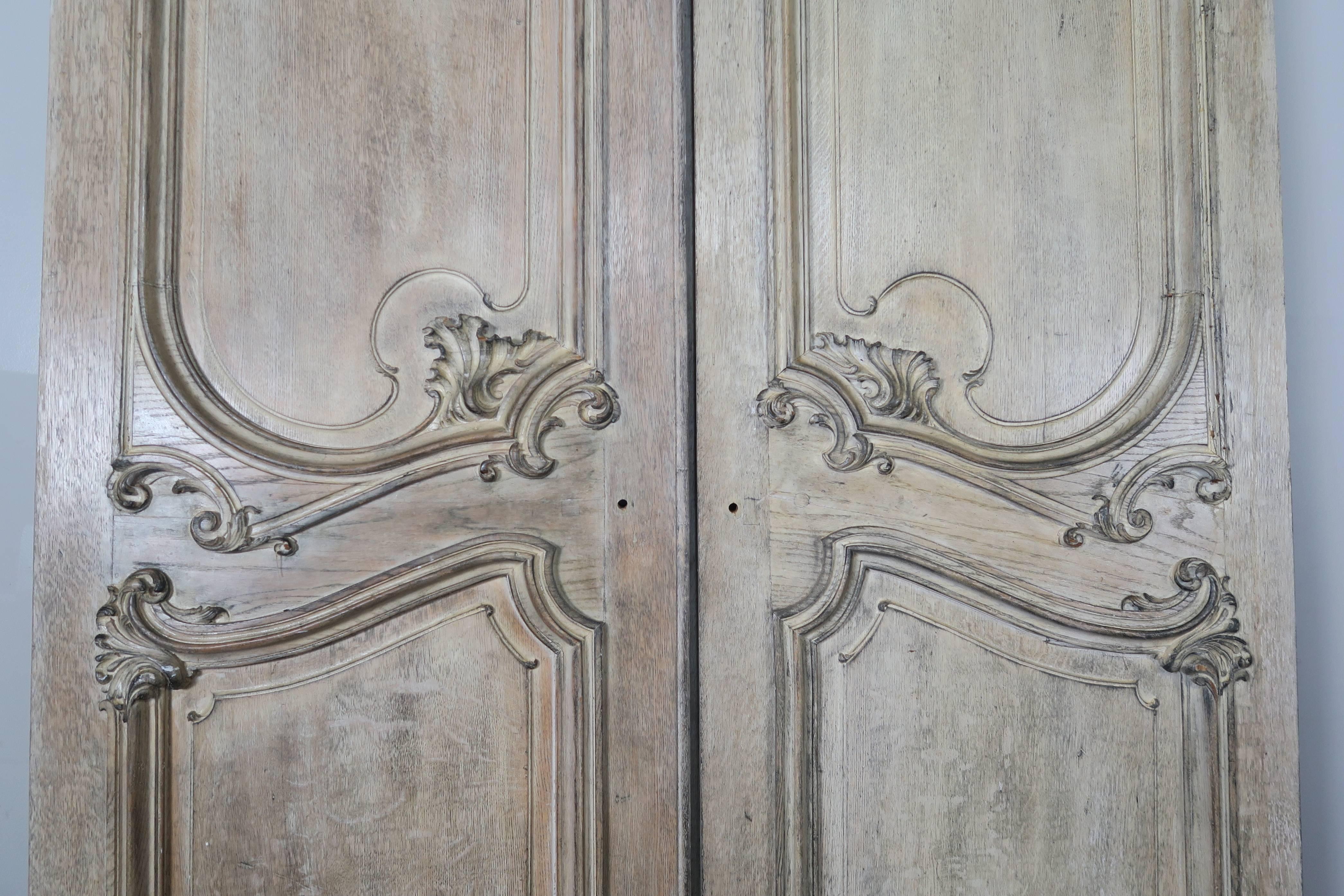 Monumental Pair of French Carved Painted Doors, circa 1900s In Distressed Condition In Los Angeles, CA