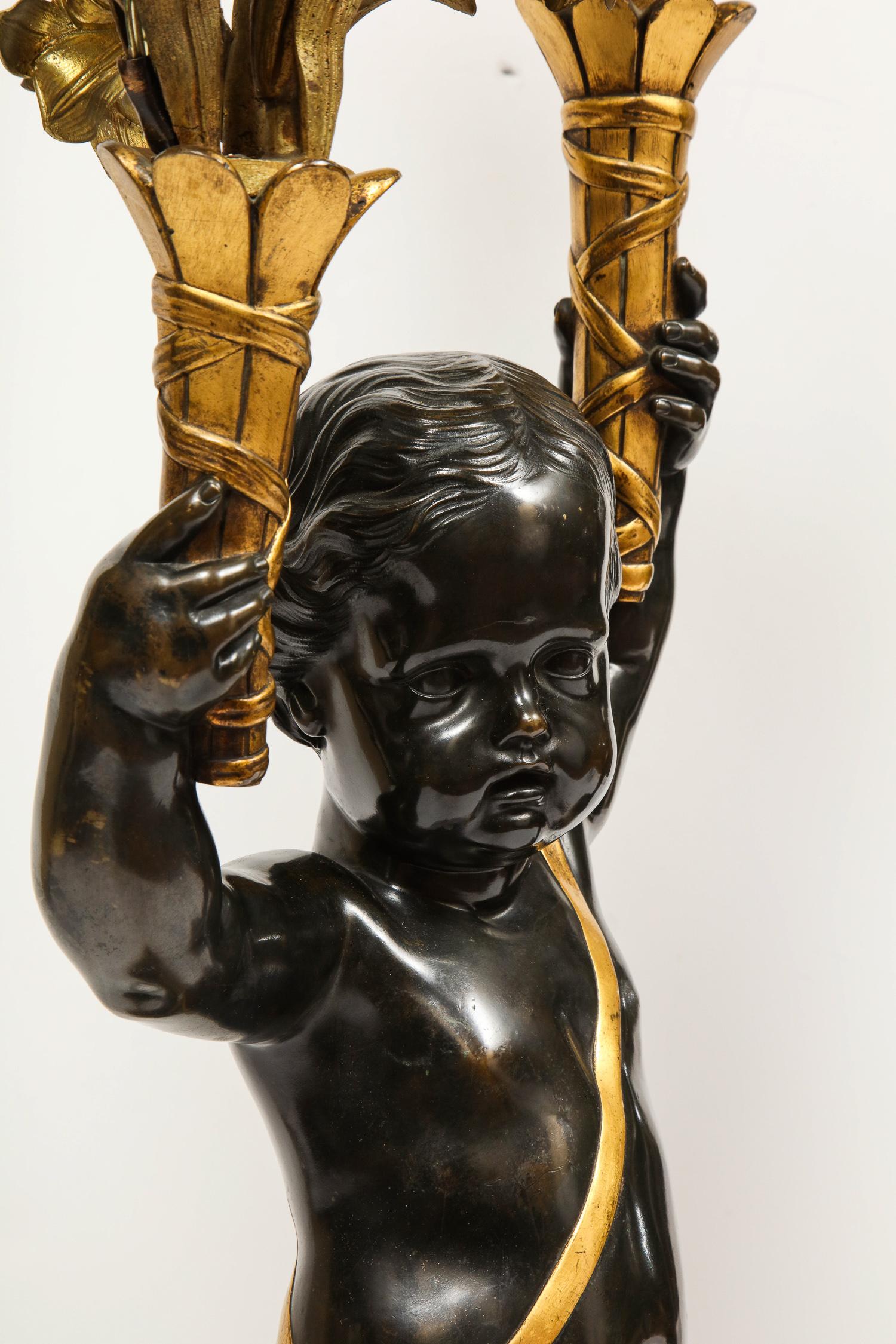 19th Century Monumental Pair of French Gilt and Patinated Bronze and Rouge Marble Candelabra
