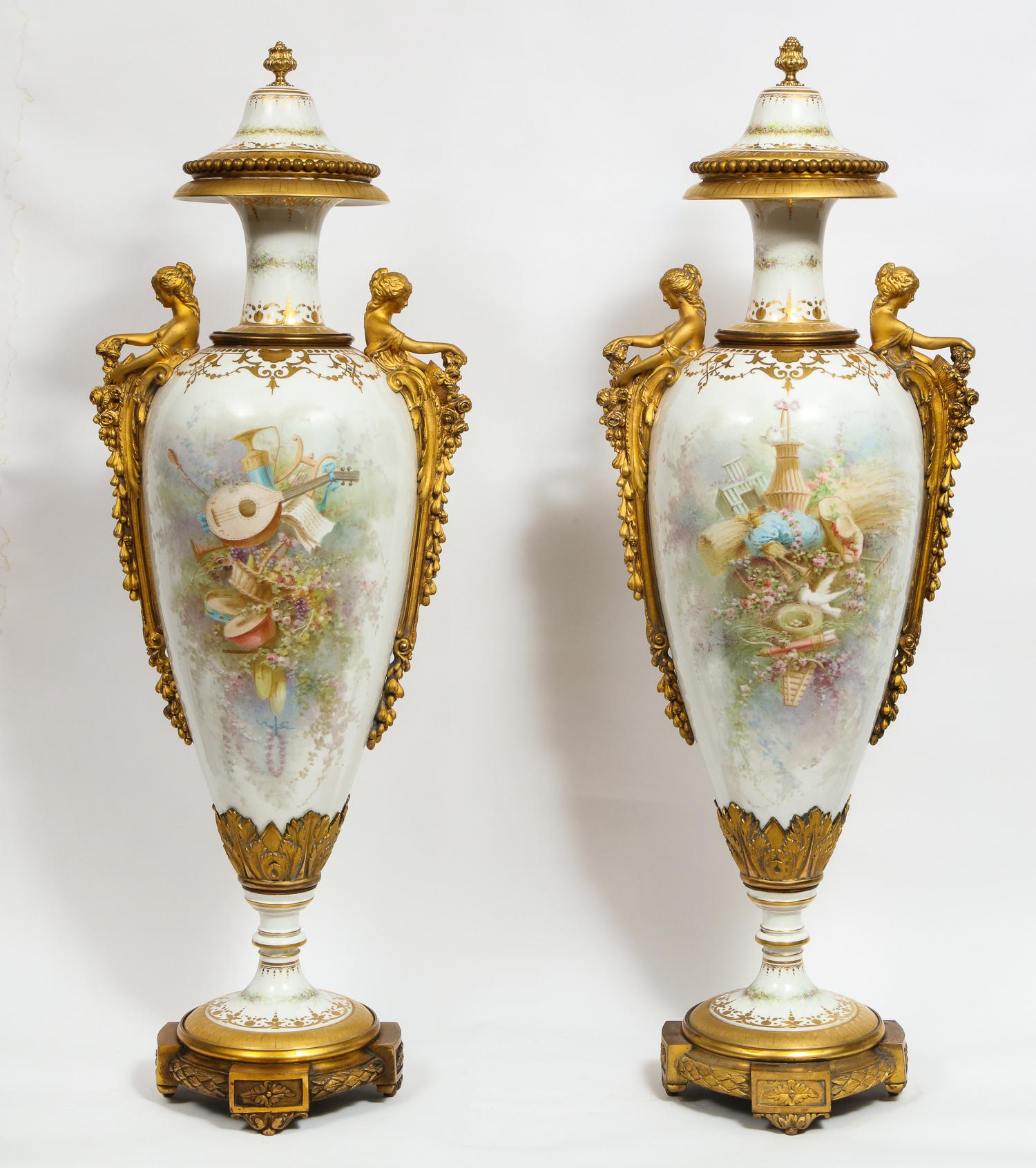 Monumental pair of French ormolu-mounted White Sèvres Porcelain vases and covers, 
by Collot, 

France, 19th century.

Measures: 42