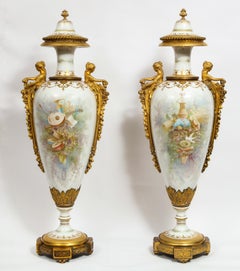 Monumental Pair of French Ormolu-Mounted White Sèvres Porcelain Vases and Covers