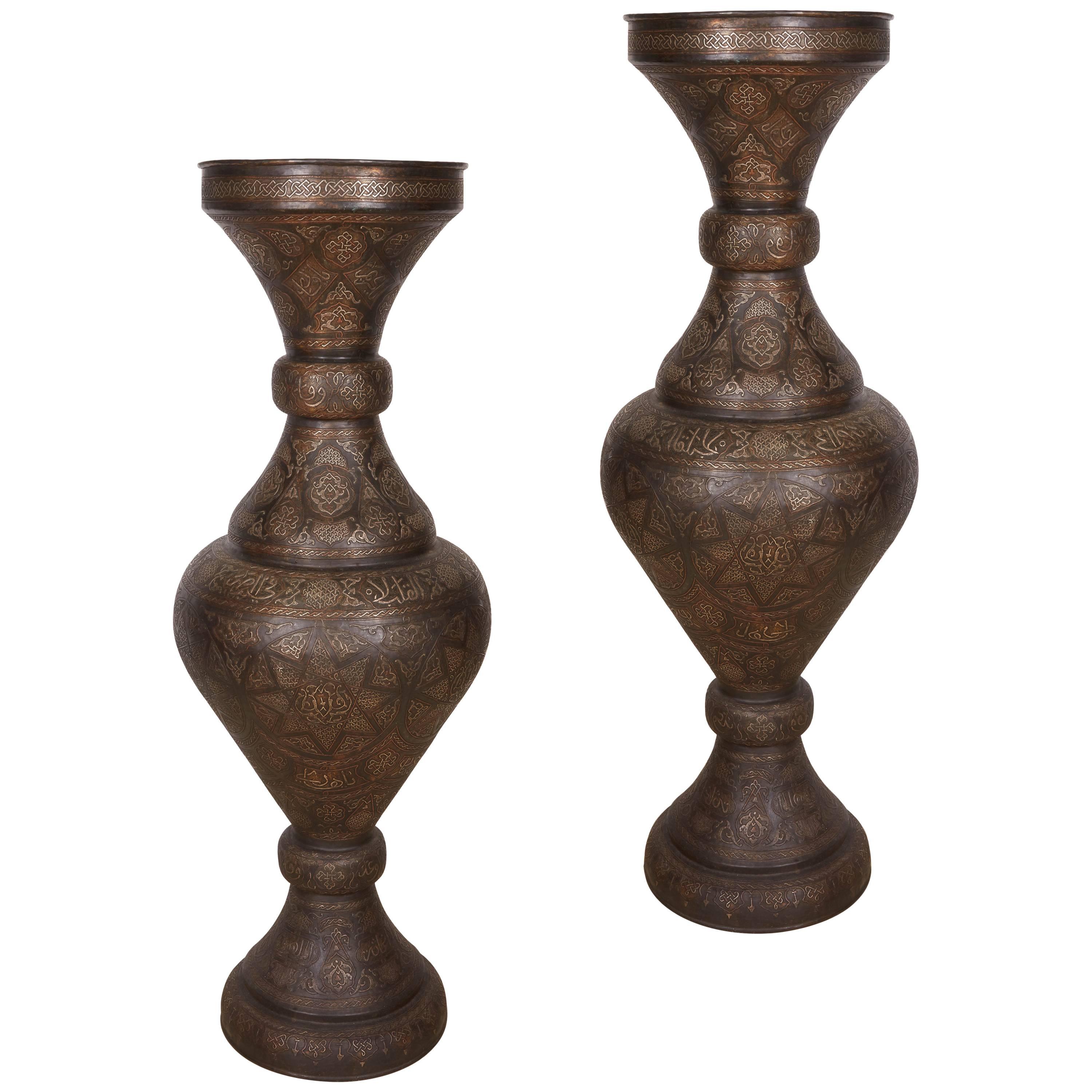 Monumental Pair of Islamic Silver Inlaid Palace Vases with Arabic Calligraphy