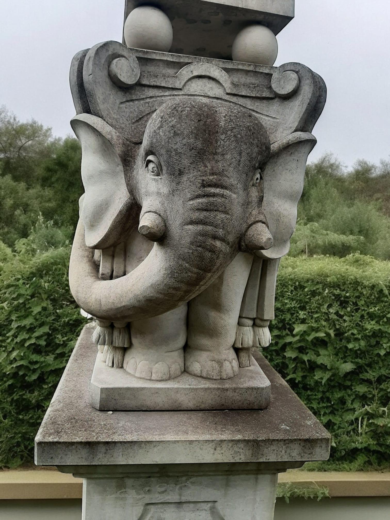 Monumental Pair of Italian Carved Stone Obelisks with Elephants 1
