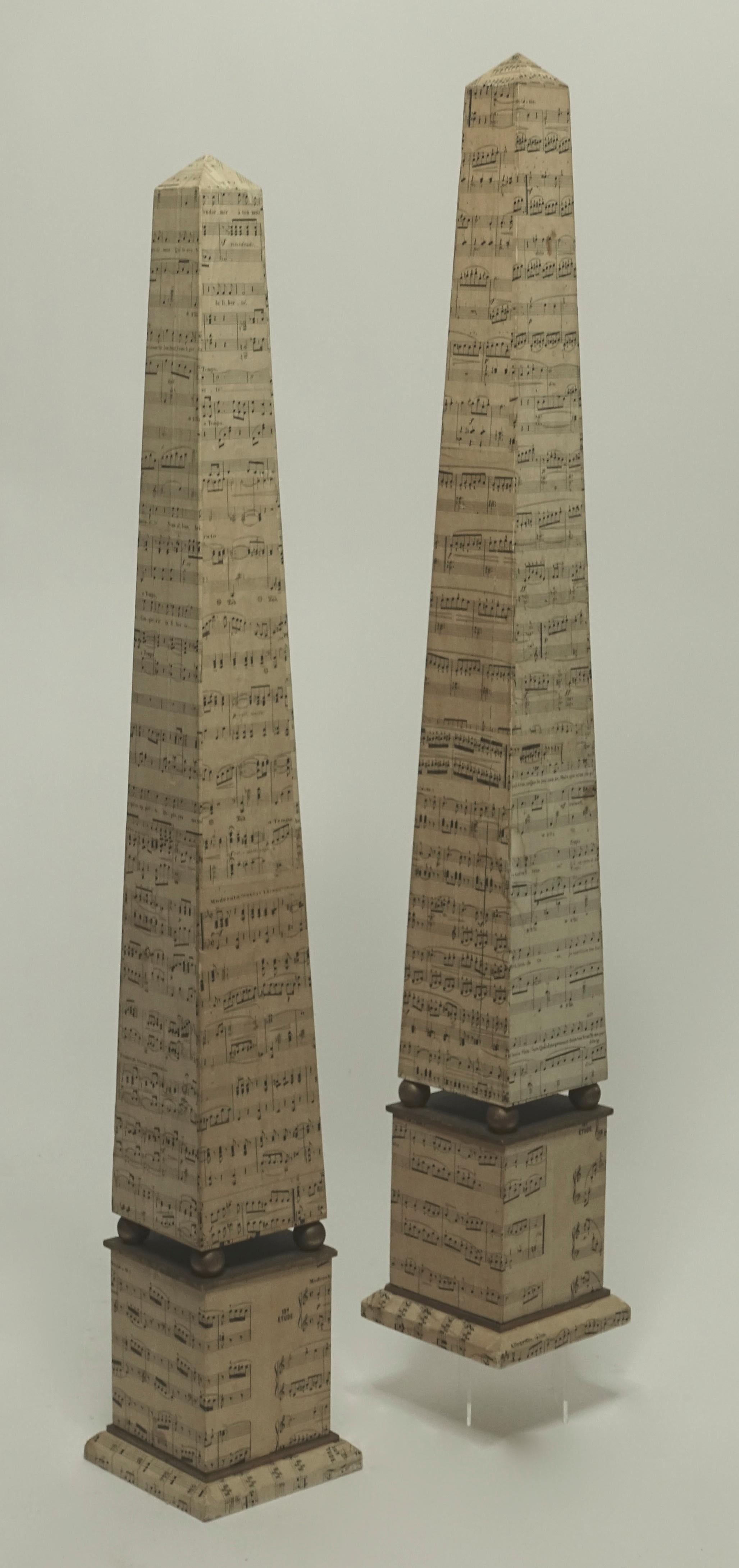 Neoclassical Monumental Pair of Italian Obelisks Covered in 19th Century Sheet Music For Sale