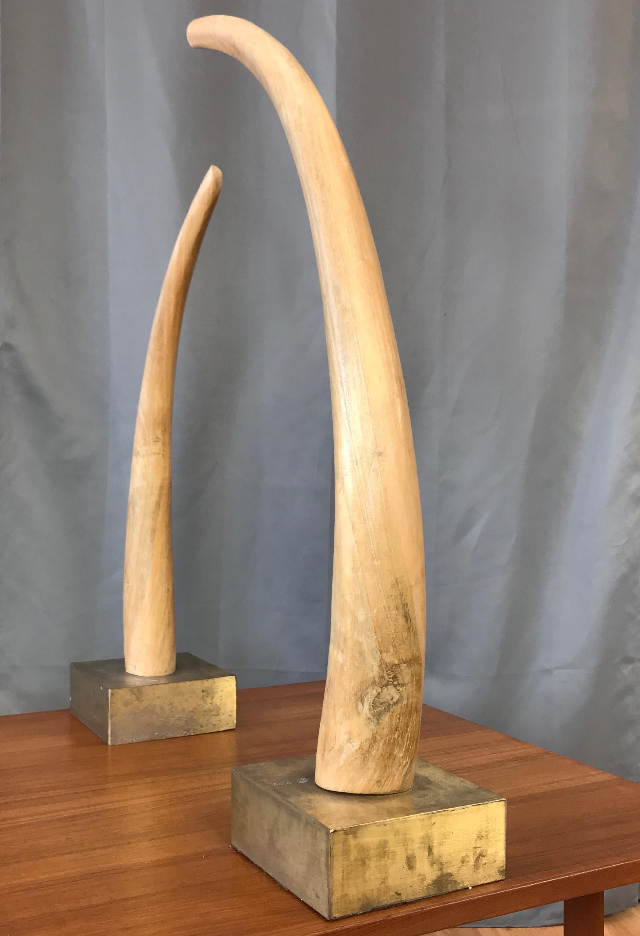 Modern Monumental Pair of Tall Carved Wood Elephant Tusks Brass Bases