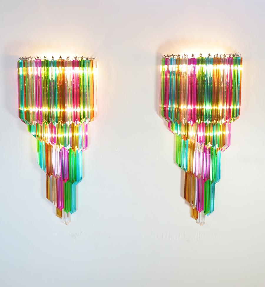 Huge and fantastica pair of vintage Murano wall sconce made by 41 Murano crystal prism (quadriedri) for each applique in a chrome metal frame. The shape of this sconce is spiral. The glasses are transparent, blue, smoky, purple, green, yellow and