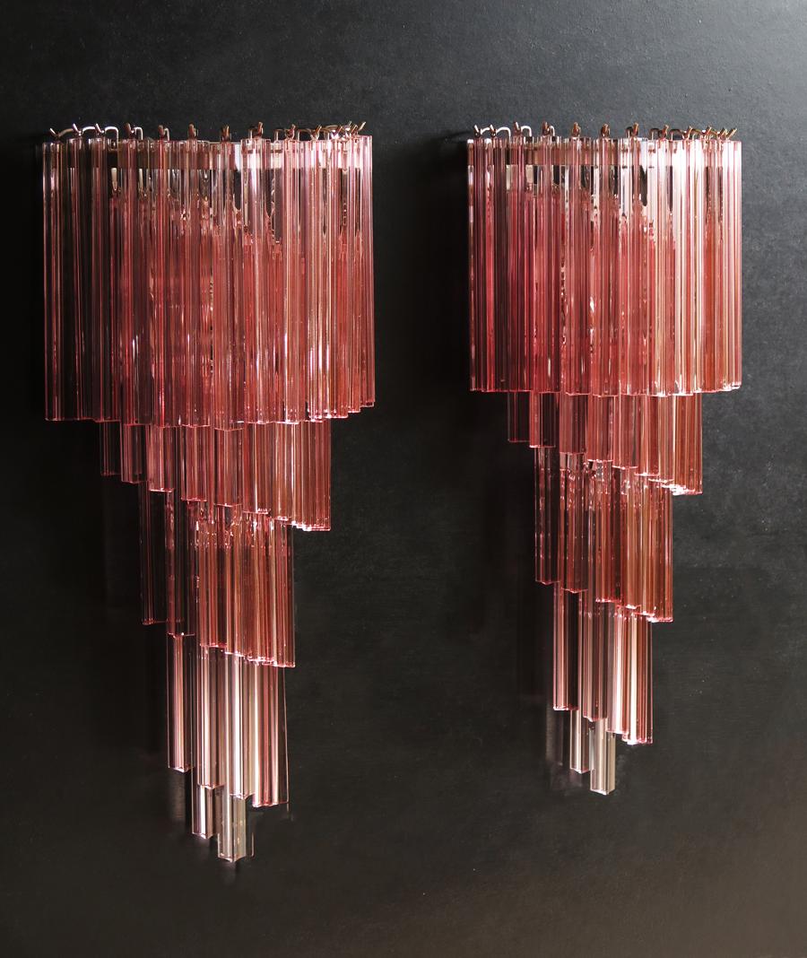 Huge and fantastica pair of vintage Murano wall sconce made by 41 Murano crystal prism (triedri) for each applique in a chrome metal frame. The shape of this sconce is spiral. The glasses are pink.
Period: Late 20th century
Dimensions: 31.50