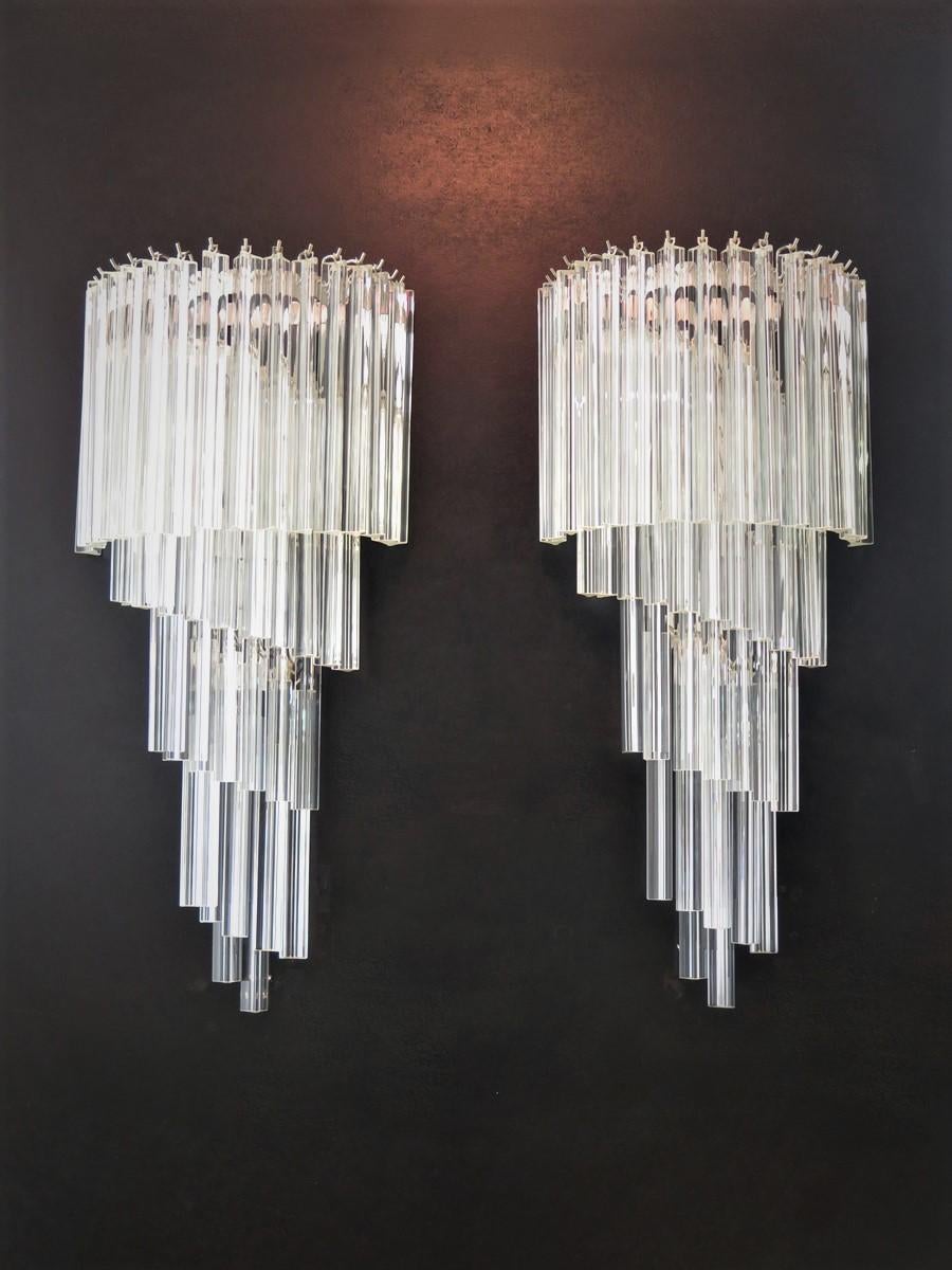 Huge and fantastica pair of vintage Murano wall sconce made by 41 Murano crystal prism (triedri) for each applique in a chrome metal frame. The shape of this sconce is spiral. The glasses are transparent.
Period: Late 20th century
Dimensions: