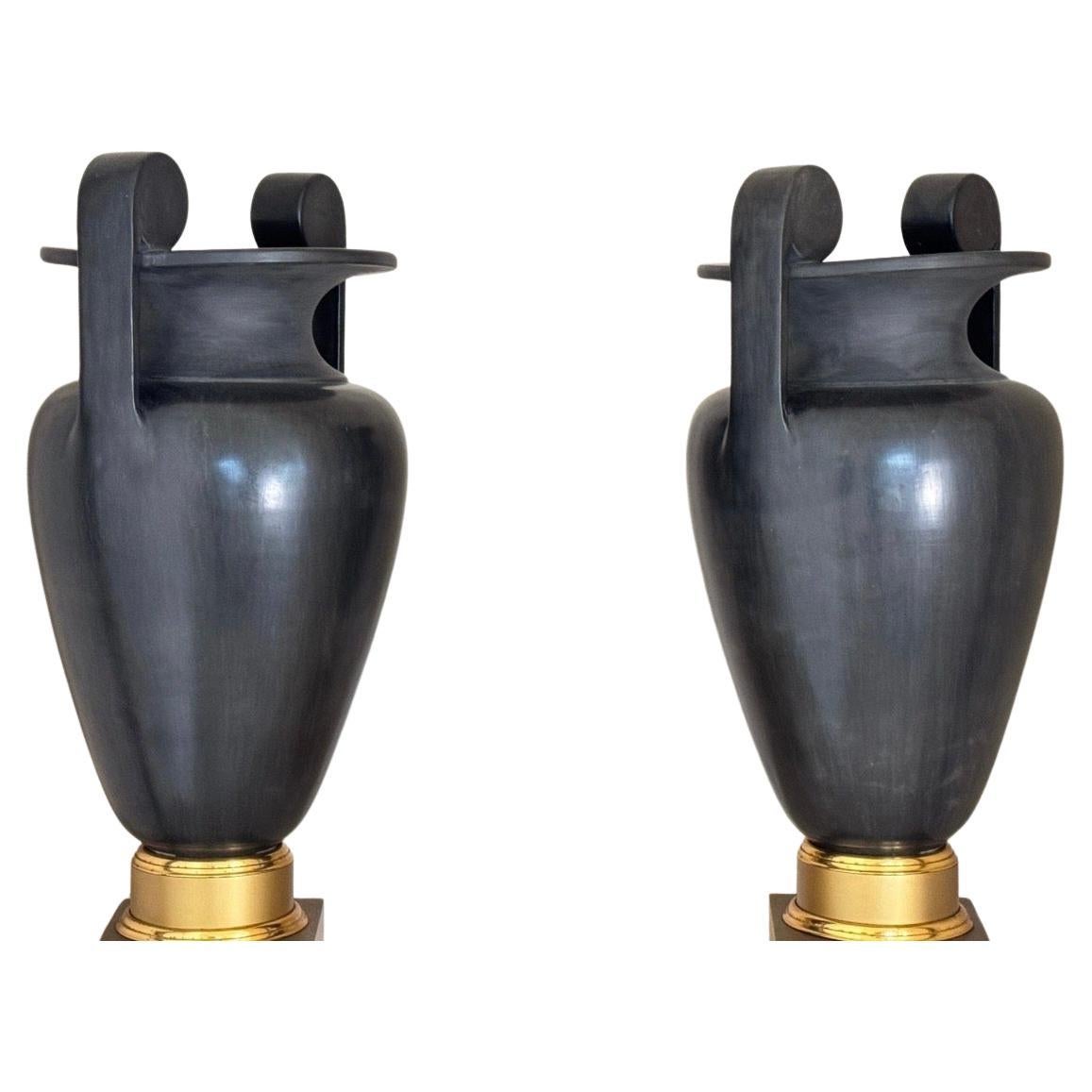 A monumental pair of porcelain black basalt-glazed neoclassical urns mounted on bronze bases
Retailed by Lorin Marsh showroom NYC.