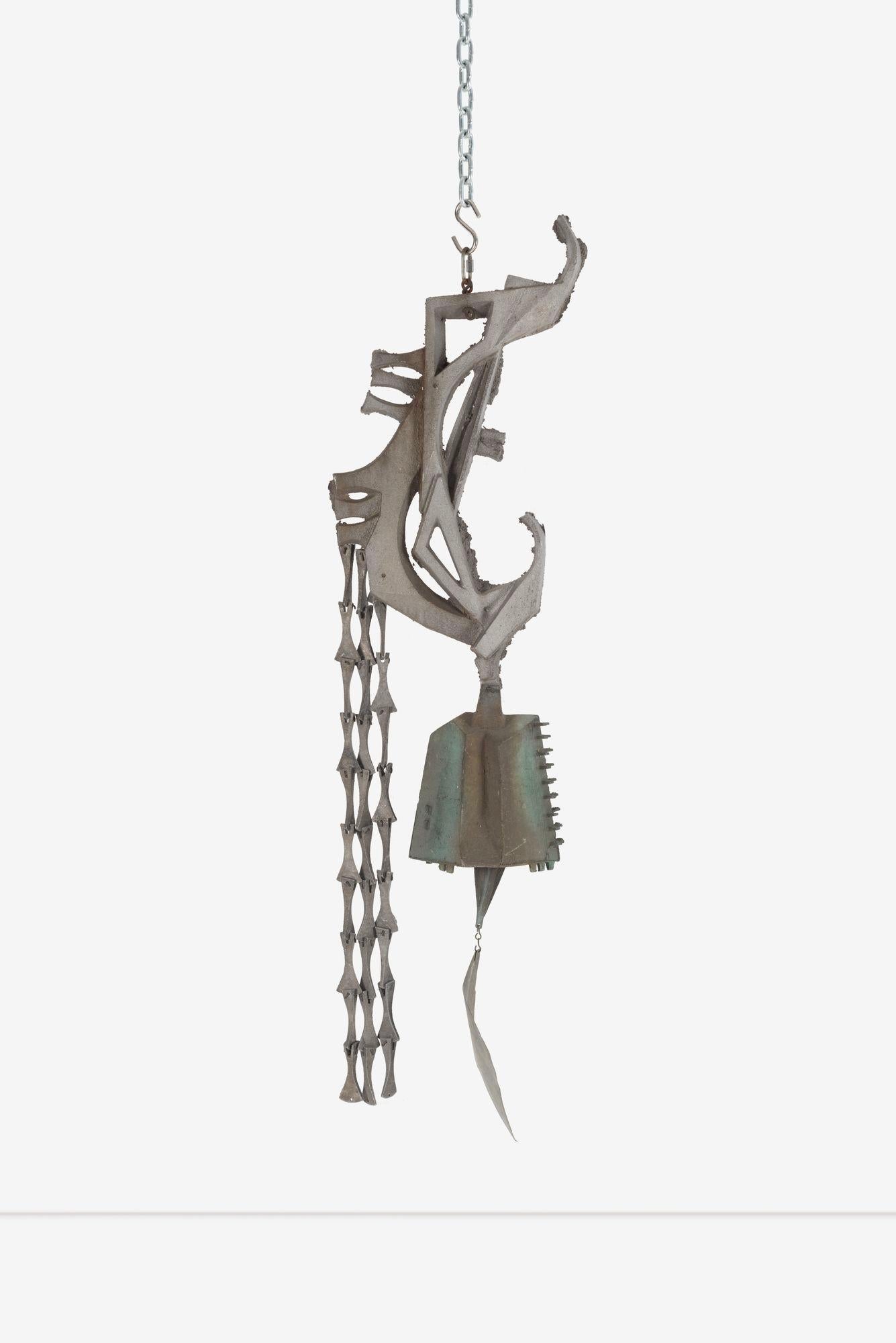 Monumental Paolo Soleri Brutalist Bronze Bell with Cast Aluminum Sculptural Spine
This striking monumental piece by Paolo Soleri features a breathtaking bronze bell supported by a cast aluminum sculptural spine. The design showcases beautiful motifs