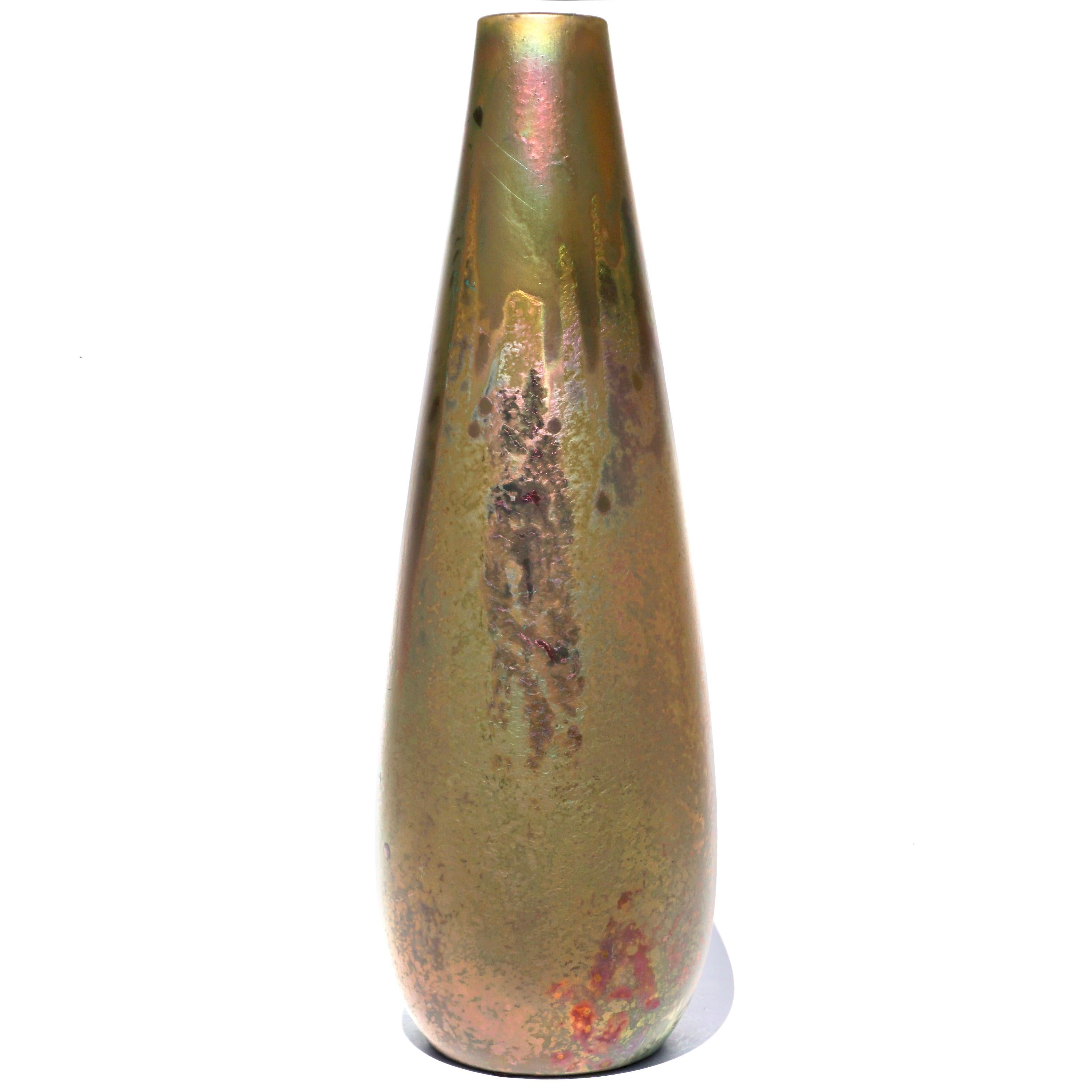 A monumental ceramic vase with iridescent glaze in an elongated bulbous shape by the legendary French ceramist Pierre Clement Massier (1845-1917). 

Massier is widely considered as the founder the modern ceramic industry of Vallauris, Southern