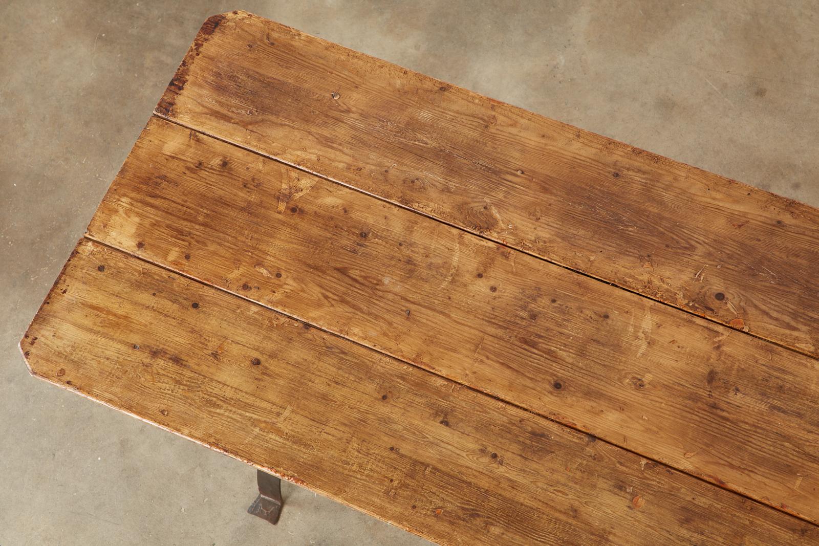 20th Century Monumental Pine Harvest Farm Table with Iron Trestle Base