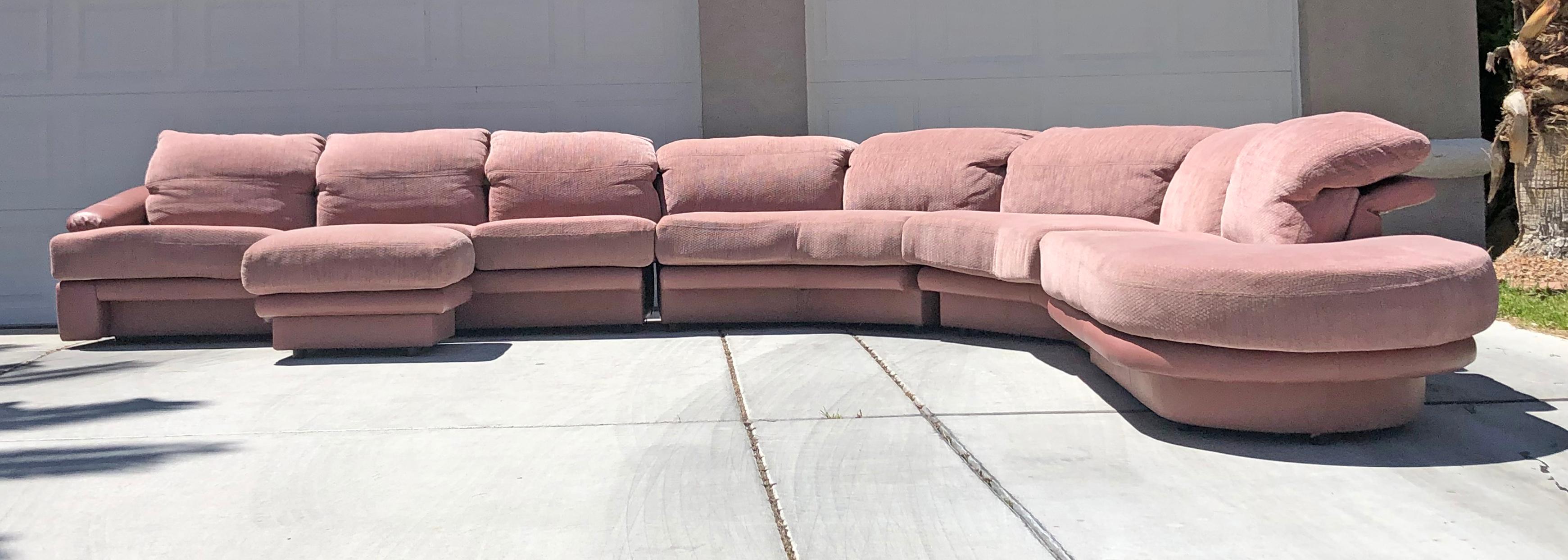 An absolutely stunning design by Vladimir Kagan for Preview, this millennial pink, or blush colored sectional is just as comfortable as it is easy on the eyes. Designed and manufactured in the 80's, the sofa is upholstered in both leather and a