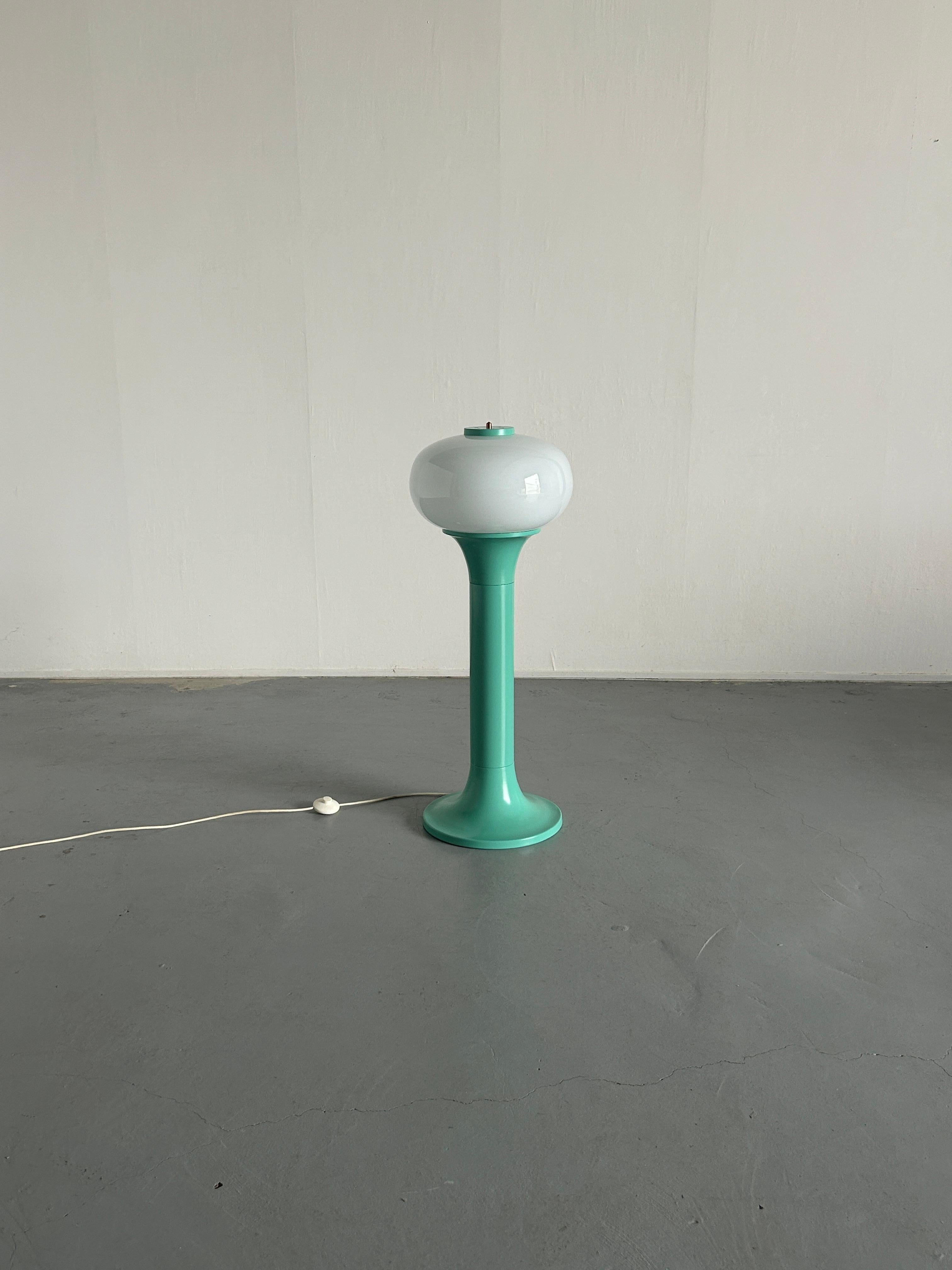 A beautiful light metal and glass Mid-century modern floor lamp. 
Produced by 'Dekor Zagreb' during the 1970s.

Tall and monumental, resembling an outdoor light fixture.
Pop art or space age style.

Fully restored in mint green colour with matt
