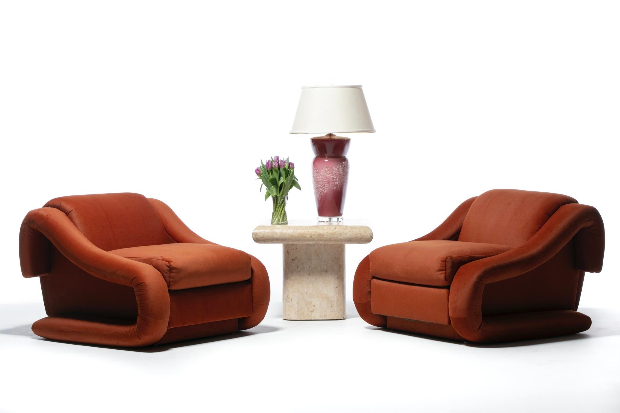Incredibly sculptural monumental size Post Modern Pair of Lounge Chairs by Weiman in new super soft Marmalade Orange upholstery. Two pair available. The intersection of Modern and Luxury. Attention grabbing lounge chairs that ooze confidence and
