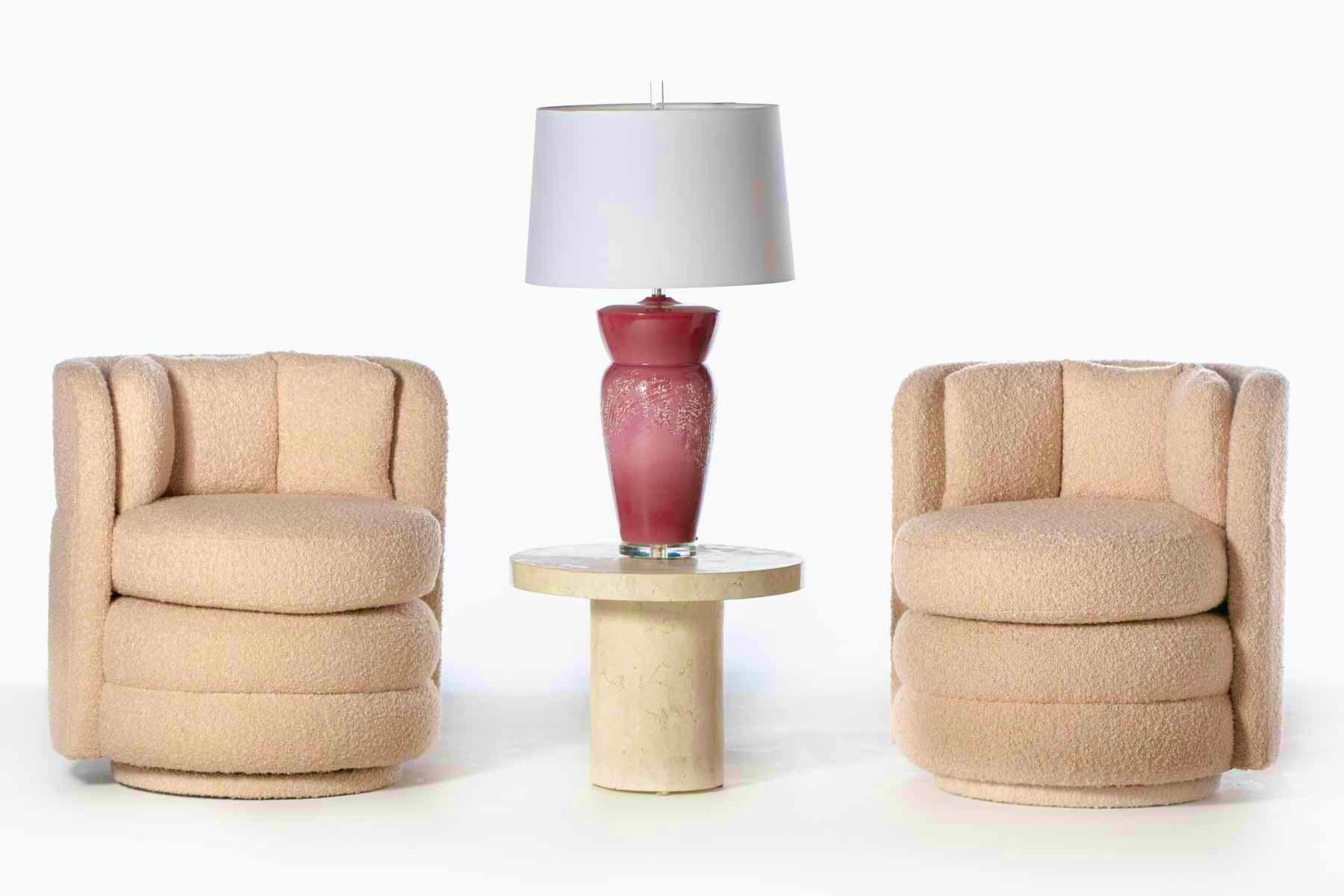 Raspberry beret all the way with this pair of large monumental pink sorbet Ceramic Lamps produced by Sunset in the 1980s. The ceramic detail work on the bodies of the lamps draws attention making no two lamps alike. The raspberry pink color is