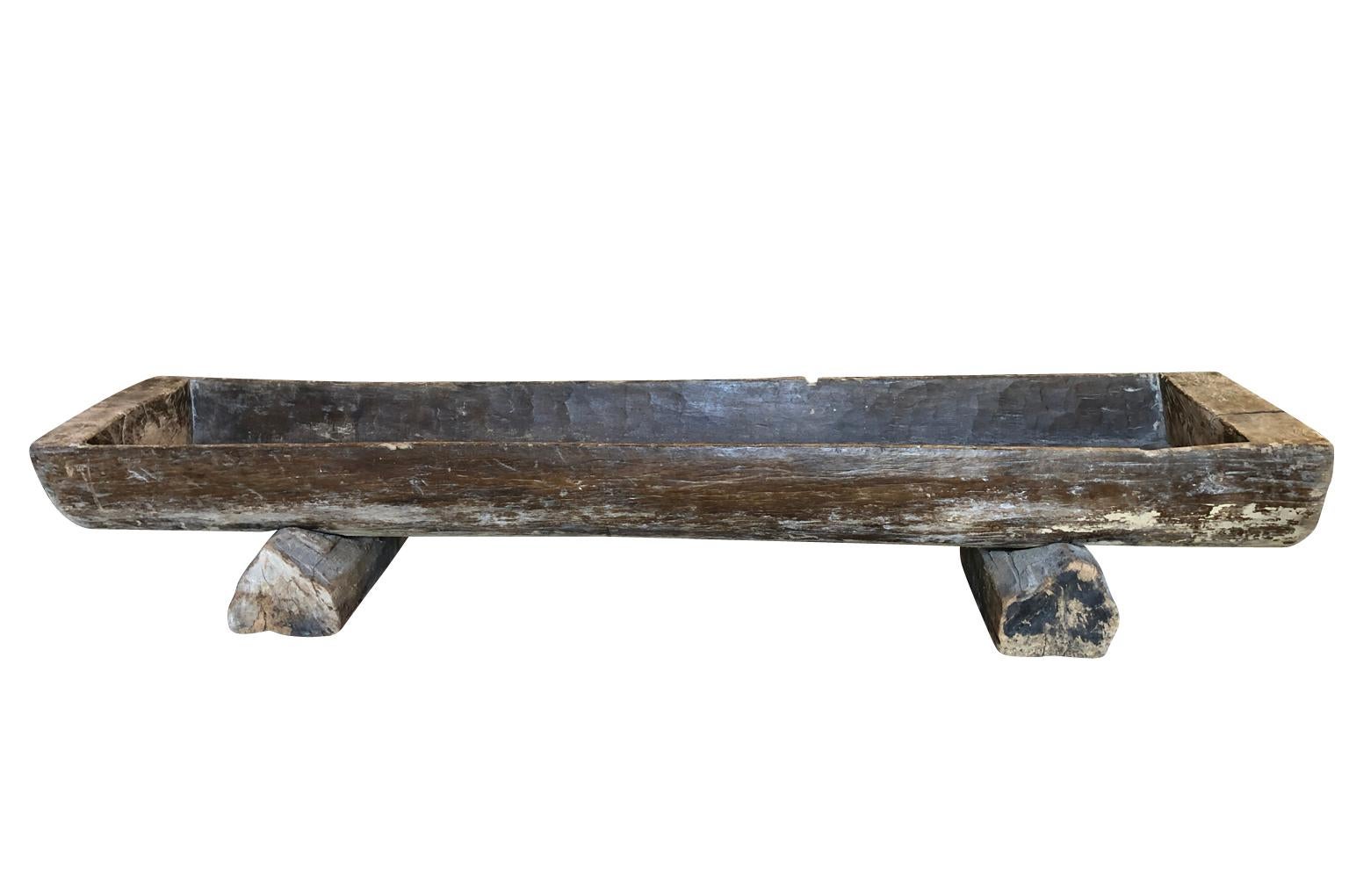 A monumental and fantastic feed trough from the Catalan region of Spain in naturally washed wood. Carved from a tree trunk. Terrific as a large planter or converted into a grand scale coffee table.