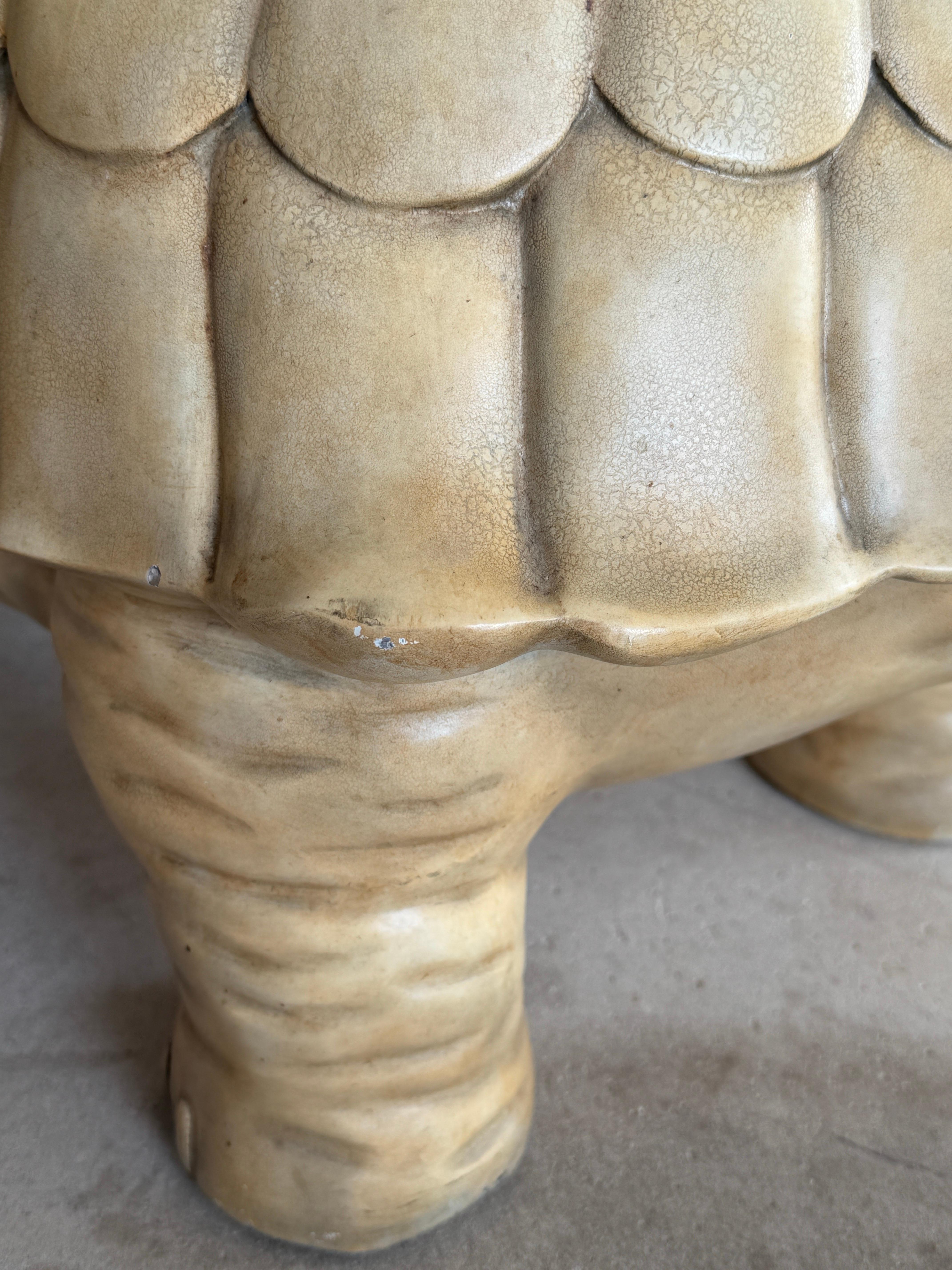 Introducing a truly whimsical and sculptural masterpiece, this cast resin turtle ottoman by Maitland-Smith is the perfect fusion of playful elegance and artistic flair, destined to elevate the aesthetic of any room. With its enchanting design, this