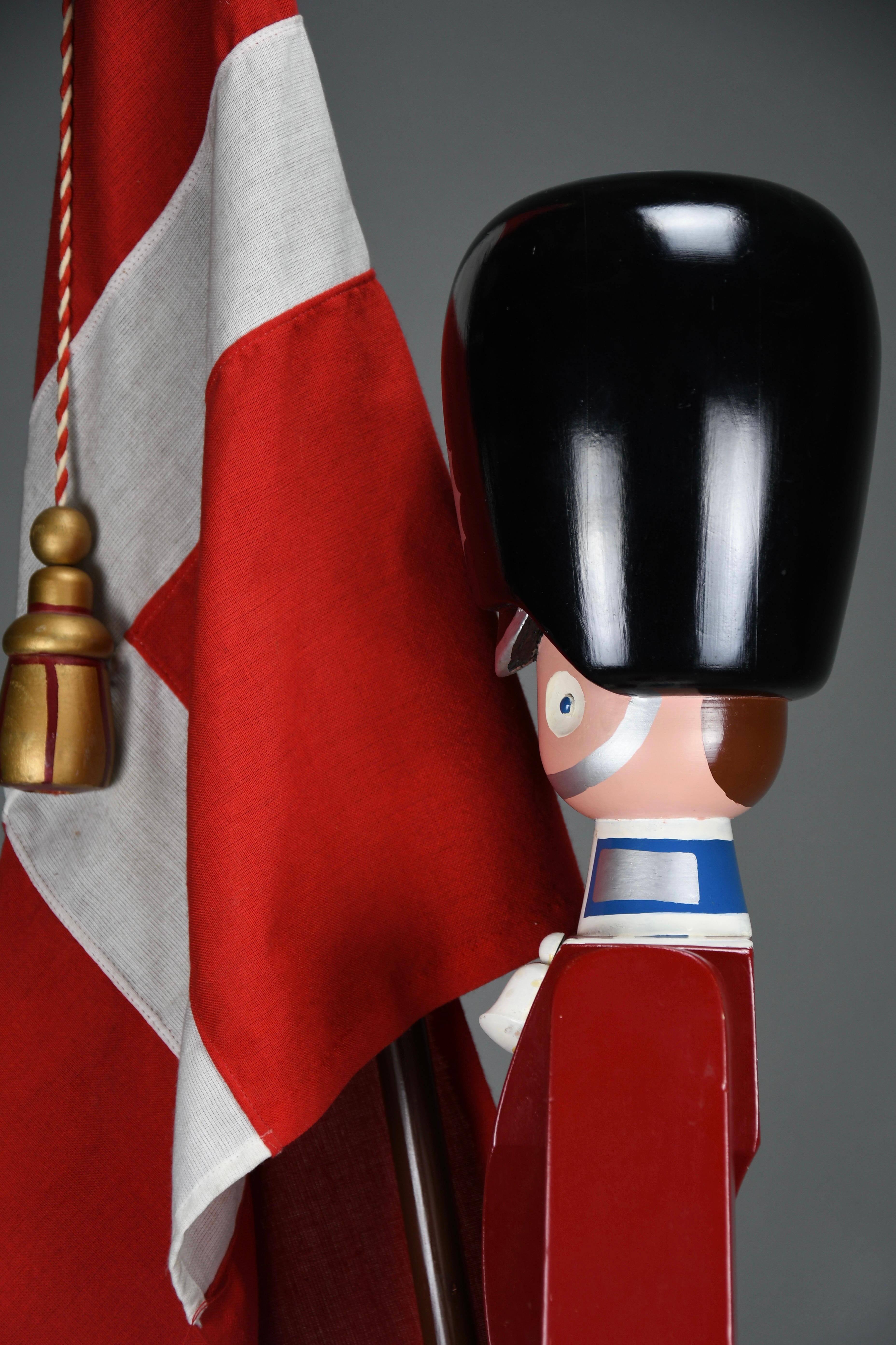 Mid-Century Modern Monumental Royal Danish Guardsman with Flag by Kay Bojesen — 168 cm (66.1 in) For Sale