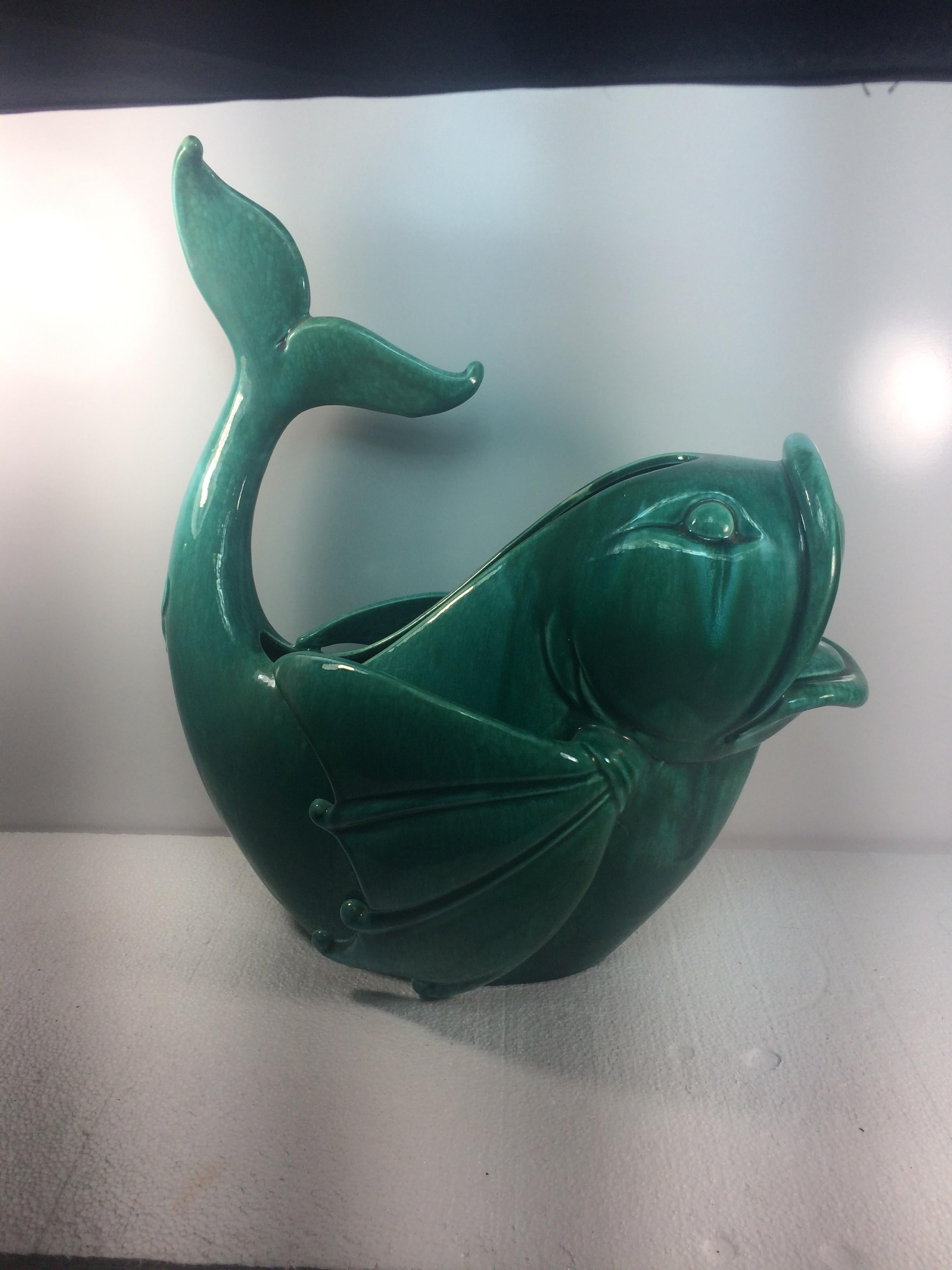 Monumental green pottery fish center piece. Made by Royal Haeger 18 inches wide 9 deep 19 inches high.