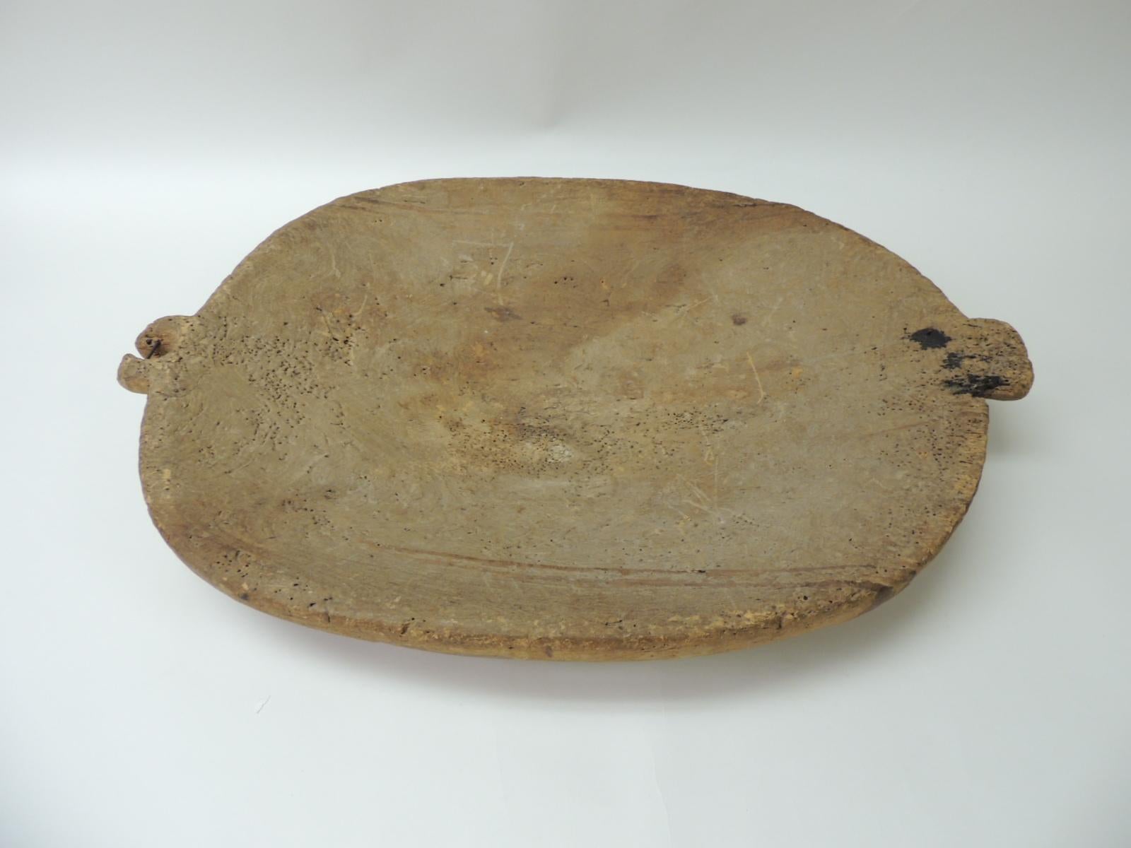Large scale rustic hand-carved solid maple wood serving bowl. 
Natural rustic primitive decorative or serving bowl.
Canada
1880s.
Size: 16 x 22 x 5 H.