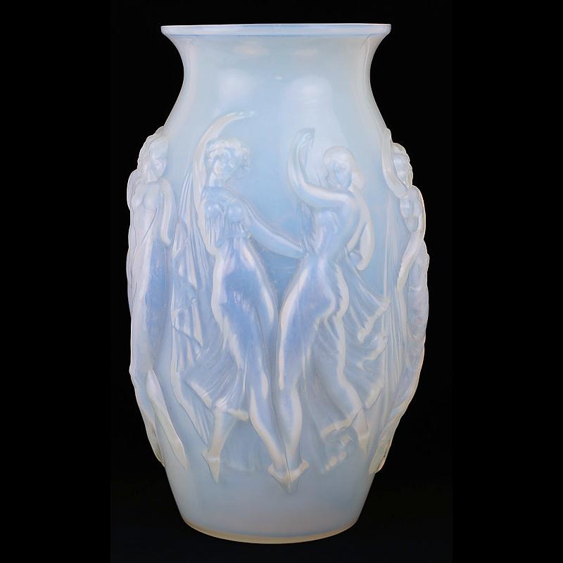 Monumental Sabino “Gaiete” (La Dance) Art Deco art glass vase. This mold-blown vase has four unique panels featuring dancing women in various poses. This large vessel is produced in opalescent glass which uses gold to produce an milky opal like