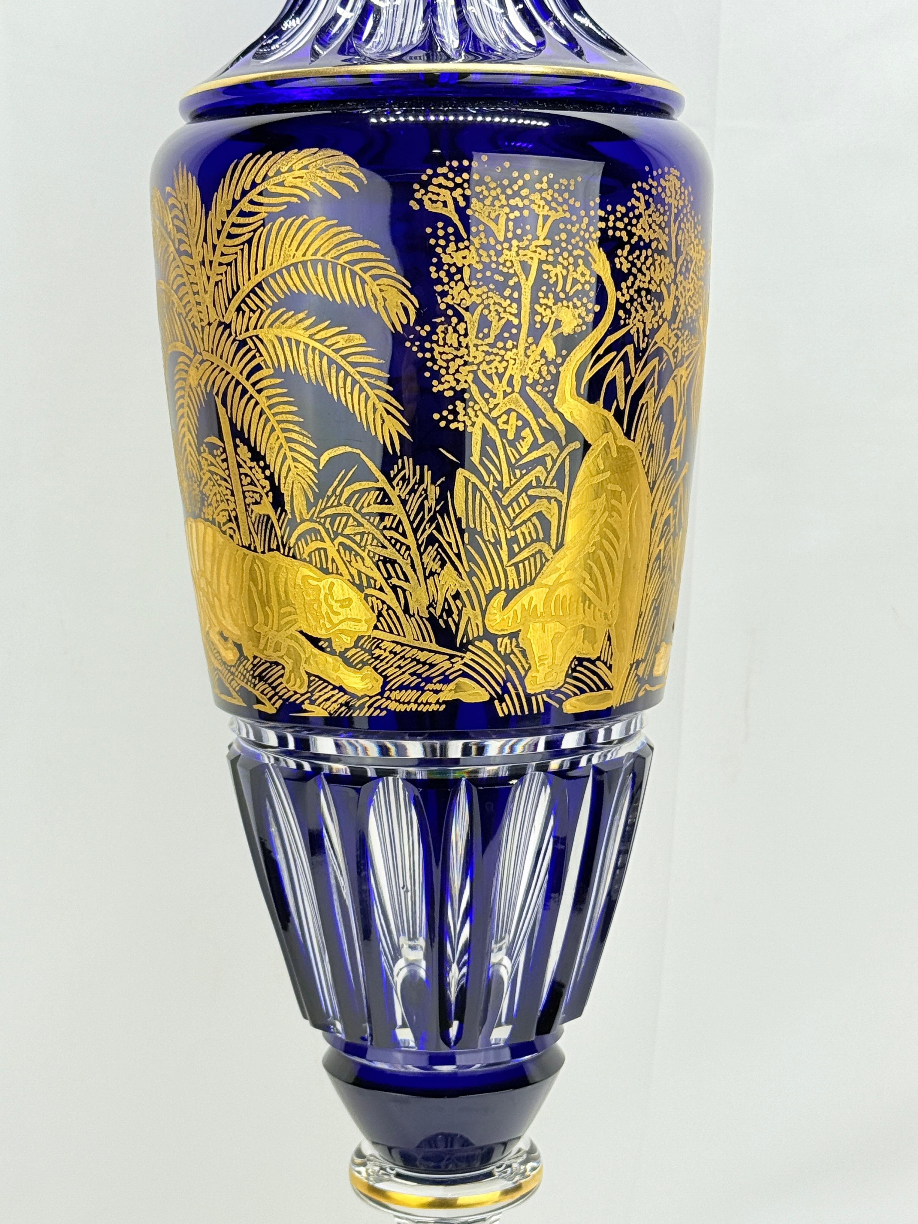 A monumental late 19th-century cut-crystal vase in two detachable sections, executed by the prestigious Verreries Royales de Saint-Louis, France. This exceptional example of Saint-Louis’s Orientalist decorative production stands 25.5 inches high and