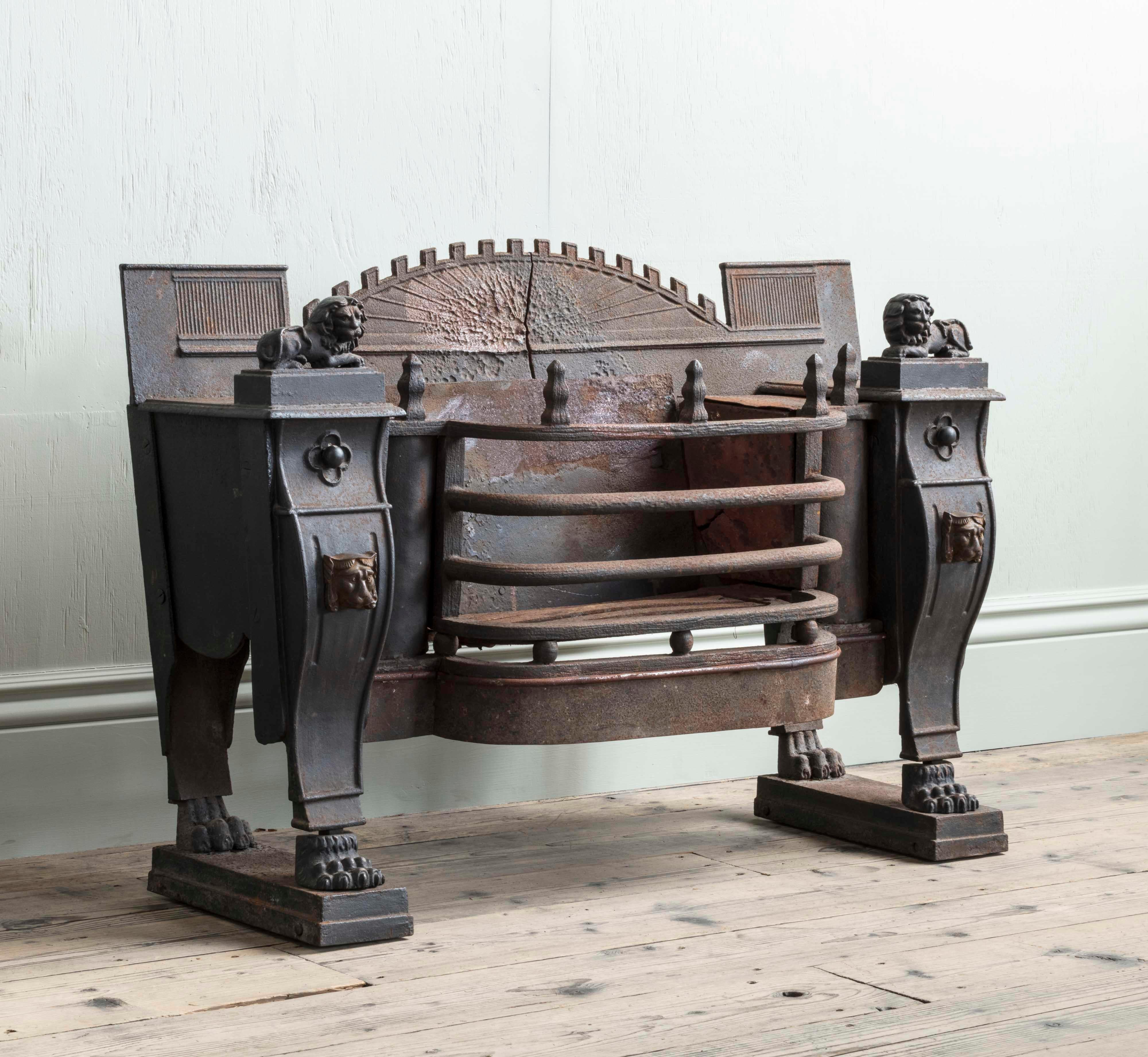 A Monumental Scale Regency Period Sarcophagus Hob Grate, with Overscale Lion Detailing.

Additional information:
Dimension: Height: 70 cm, 27 1/2″
Width: 105.5 cm, 41 1/2″
Depth: 37 cm, 14 5/8″