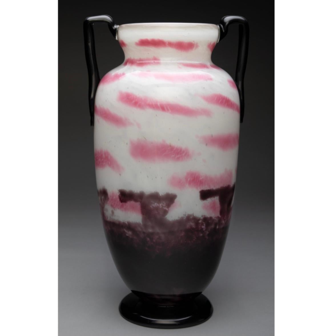 Monumental Schneider Mottled Glass Two-Handled Vase, circa 1920
Marks: Schneider, MADE IN FRANCE, G 16/2
Height: 22.75 inches (57.8 cm)
Diameter: 12.25 Inches
Art Deco decorated forms and design.

Condition: In overall very good condition, no issues