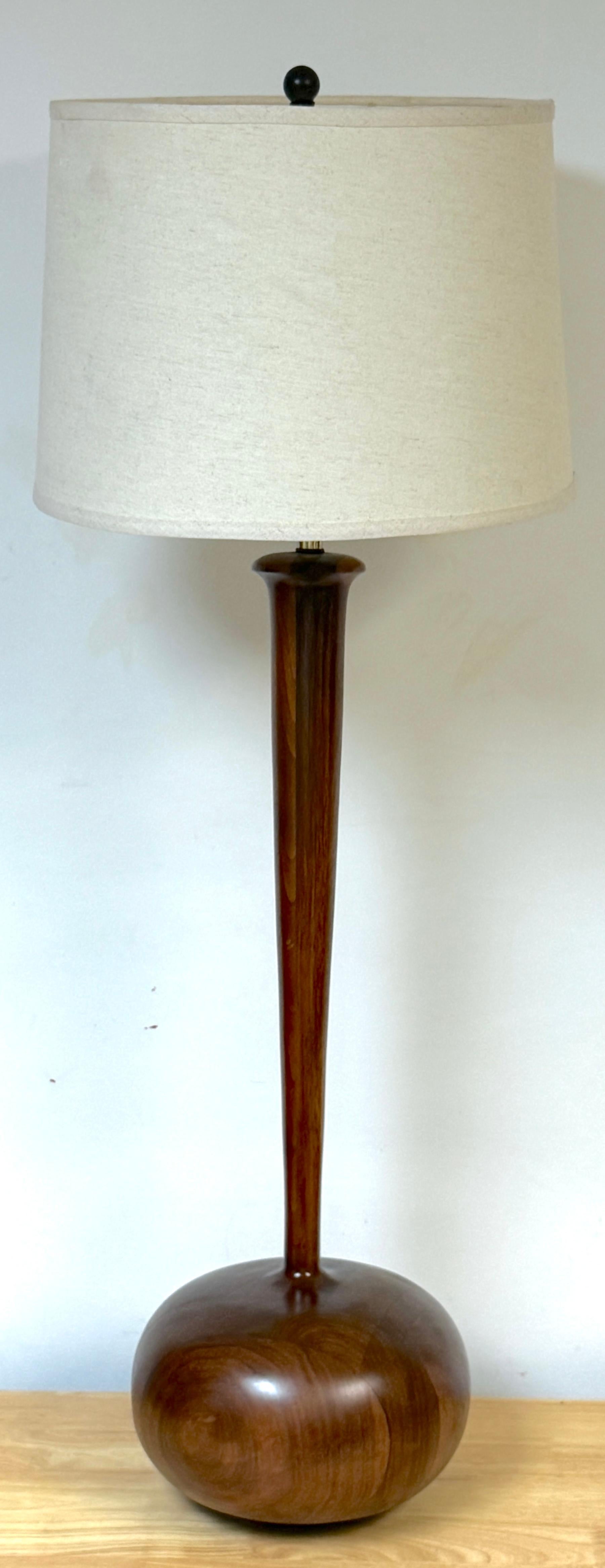 Monumental Sculpted & Inlaid Walnut Lamp after Philip Powell
USA, circa 1960s

A monumental sculpted and inlaid walnut lamp, hand-made in the USA circa 1960s, inspired by the designs of Philip Powell. This sleek and sculptural work stands 29 inches