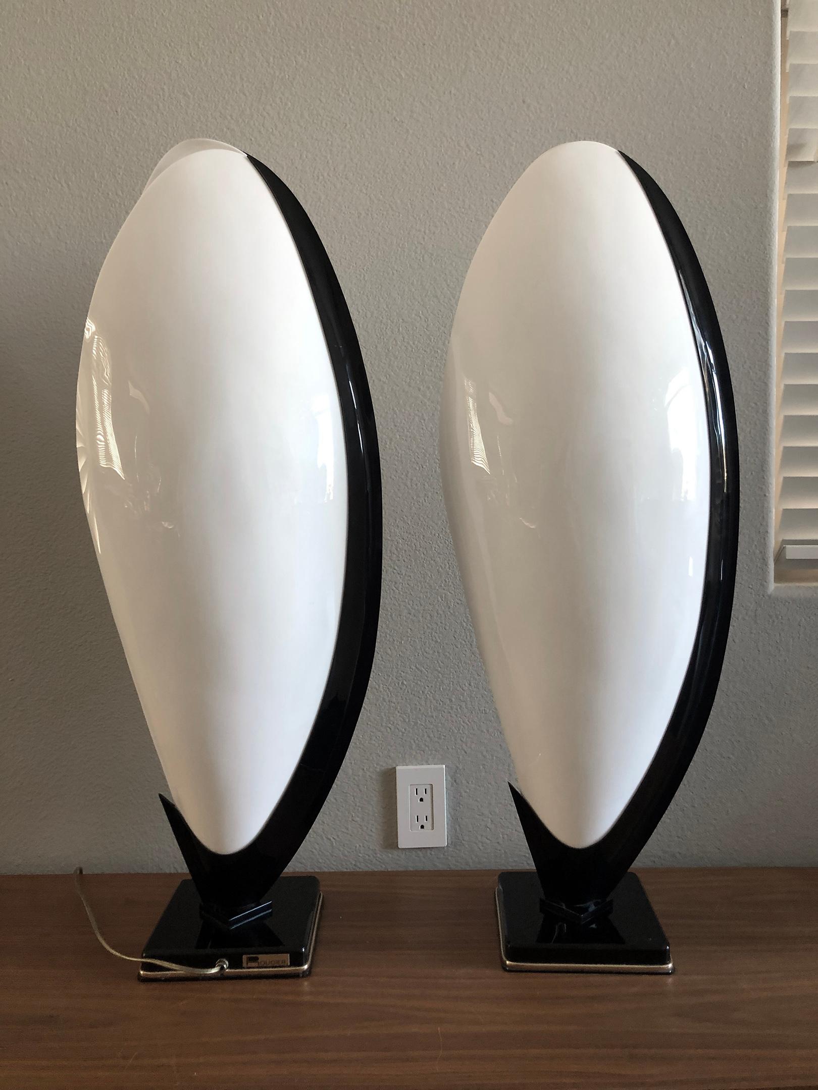 An absolutely gorgeous design by Rougier, these monumental sized oyster shaped acrylic table lamps are truly functional works of art. Dealers in the past have actually marketed these lamps as floor lamps in the past. Within the listing, there is a