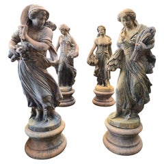 Scultura monumentale "Le 4 stagioni" in terracotta da Impruneta con base 180