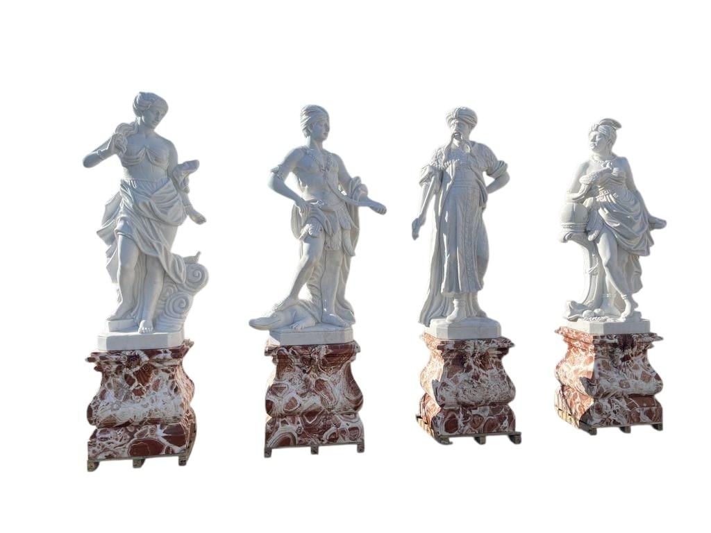 Impressive and rare set of four monumental sculptures representing the allegorical figures of the Four Continents (Europe, Asia, Africa, and America), hand-carved in Italy from a combination of Rosso marble and white Carrara marble. Each figure is