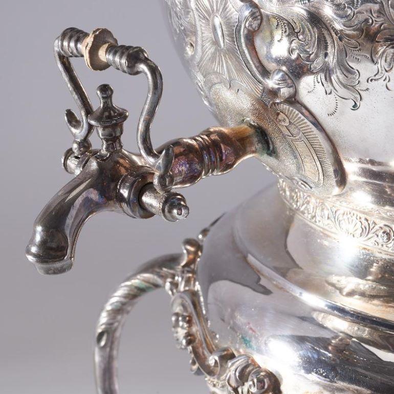 One of a kind massive and monumental 19th century Victorian style silver plate tea urn / samovar from the 19th century by Hartford-based silversmiths Rogers & Smith, chased and decorated with bucolic landscapes, flowers and waterfowl, engraved