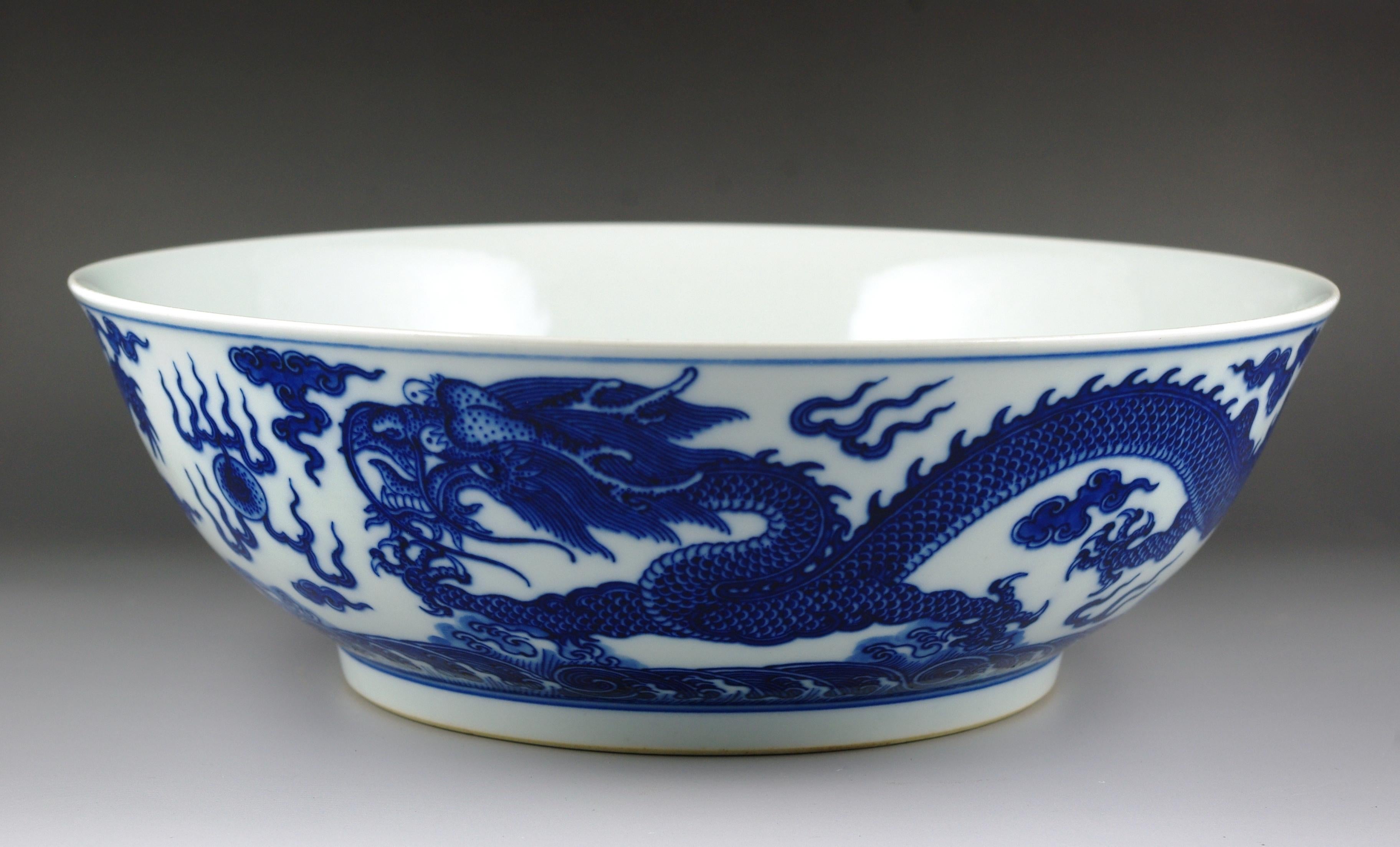 A monumental early 20th-century Chinese porcelain bowl, a magnificent piece that showcases the pinnacle of craftsmanship in the realm of Chinese porcelain artistry. This substantial bowl stands as a testament to the enduring allure and innovation