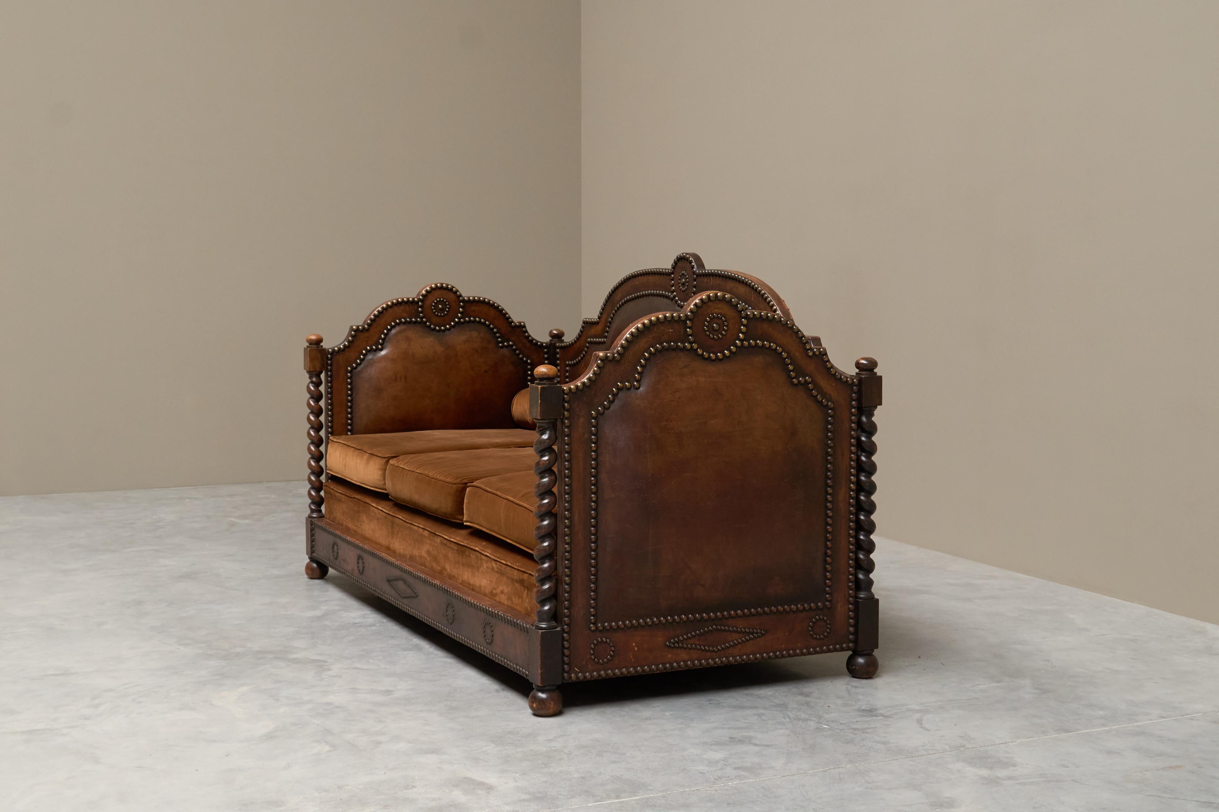 European Monumental Sofa in Patinated Brown Leather, Studs and Velvet Late 19th Century For Sale