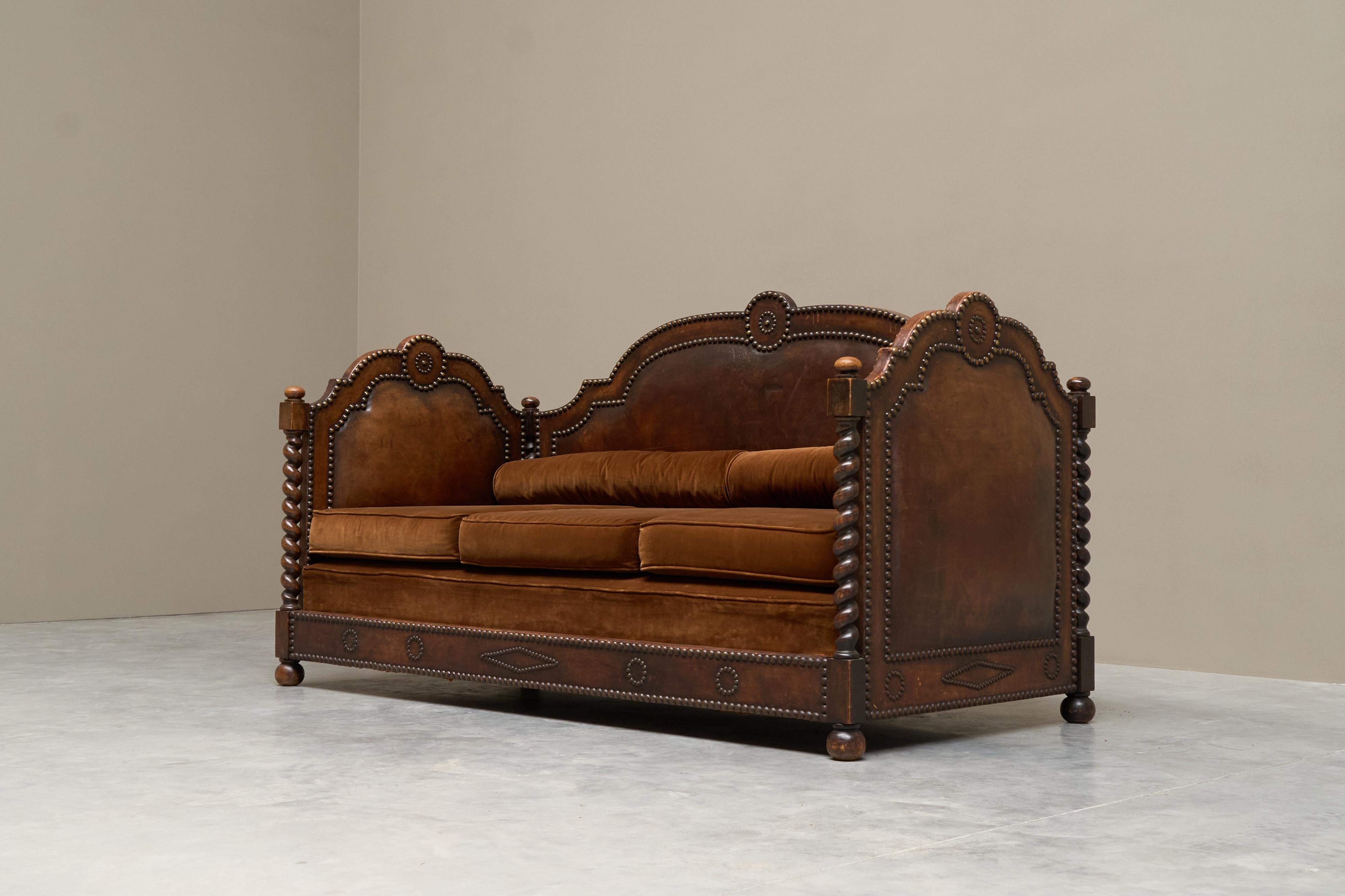 Brass Monumental Sofa in Patinated Brown Leather, Studs and Velvet Late 19th Century For Sale