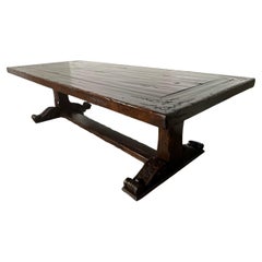 Monumental Spanish Revival Carved Trestle Dining Table, Early 20th Century