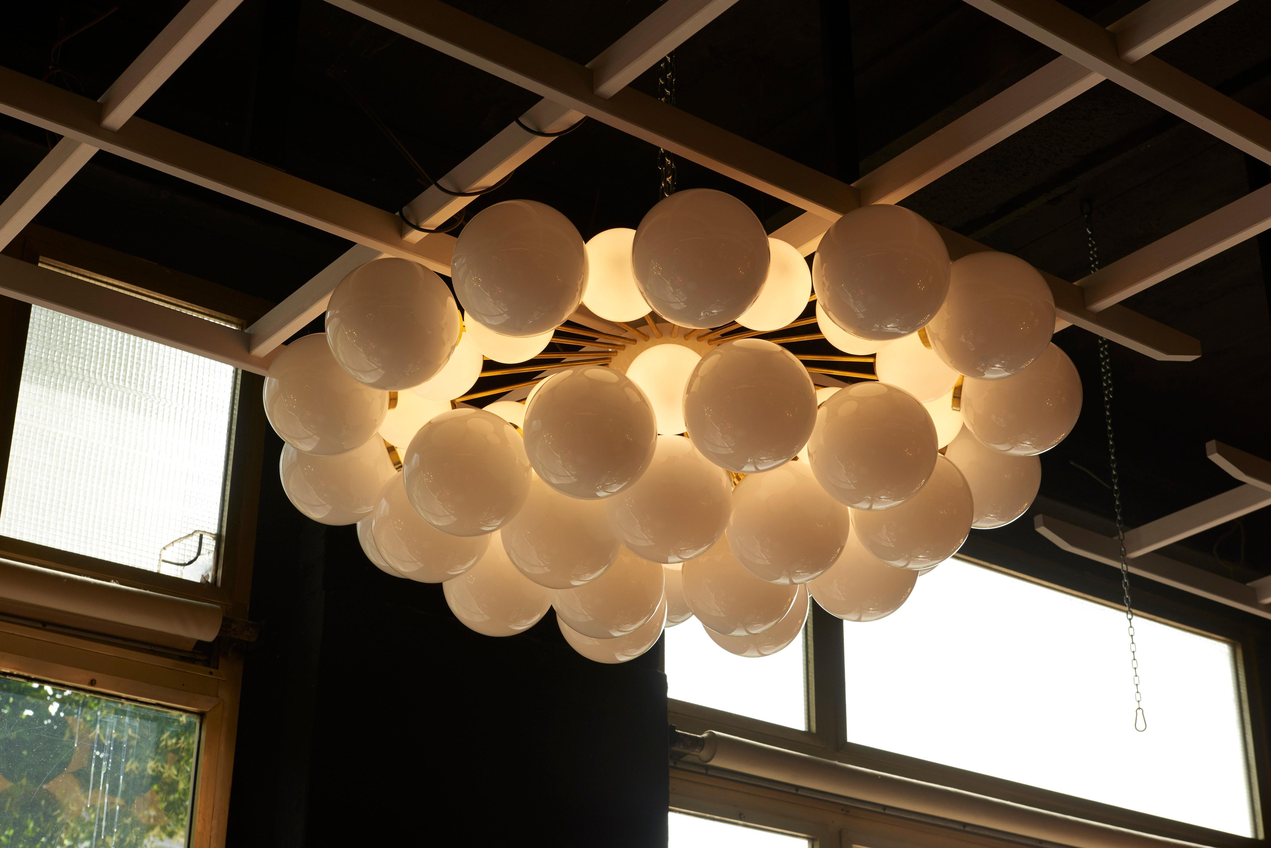 Monumental and impressing sputnik or cloud chandelier. The chandelier is a real eyecatcher in every room and it is in excellent condition. 24 x E14 bulbs.

To be on the safe side, the lamp should be checked locally by a specialist concerning local