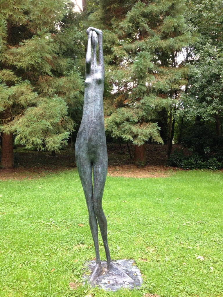 Monumental standing figure I, arms raised is a large-scale bronze sculpture by French contemporary artist Pierre Yermia. Available in limited edition of 8 + 4 artist’s proofs, signed and numbered.
This work is suitable for outdoor installation. It
