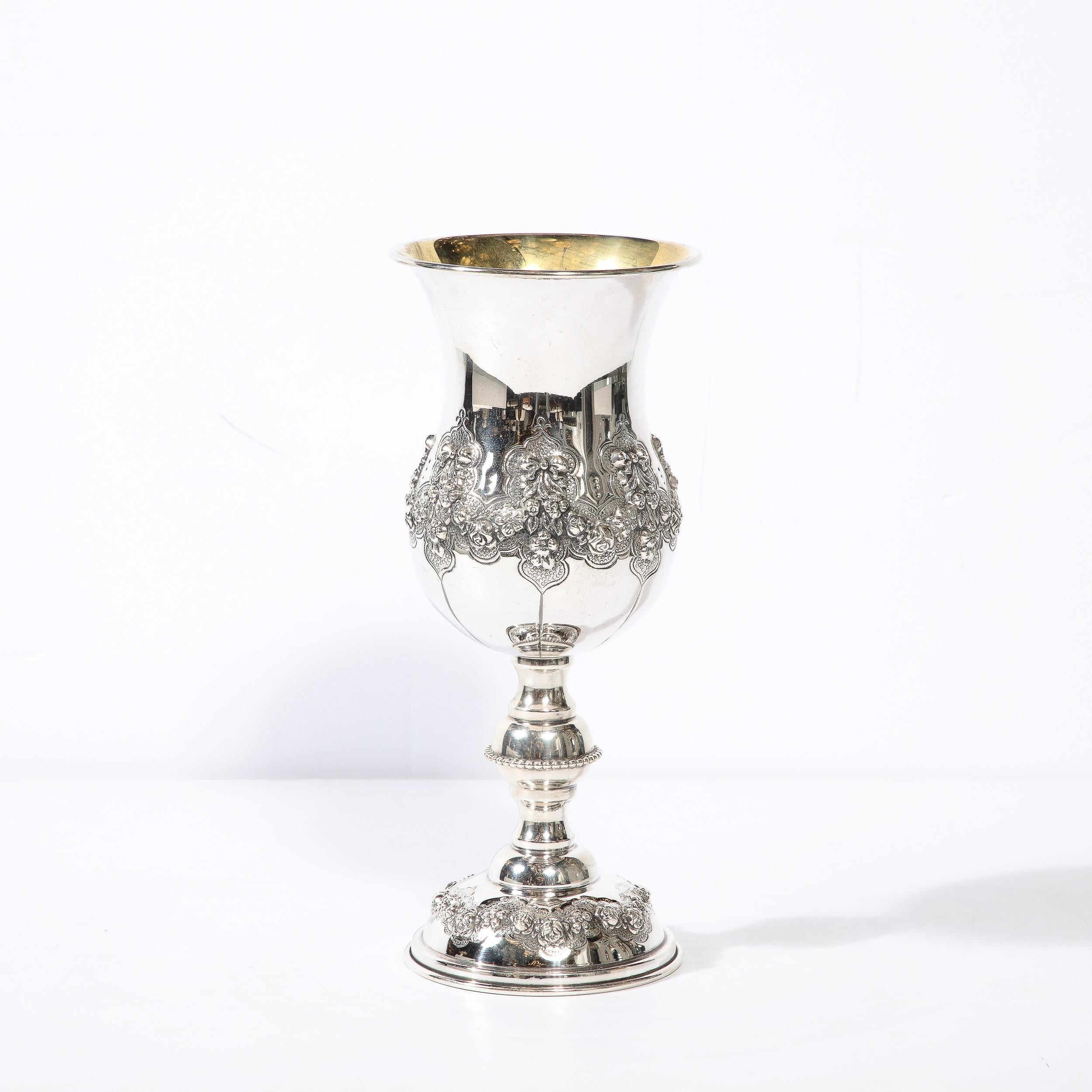 This gorgeous large Sterling Silver Kiddish goblet with beautiful floral swag design is executed in the reposse style. Hadad Brothers, an esteemed silver and Judaica company in Israel during the 20th Century. A beautiful and substantial piece, this