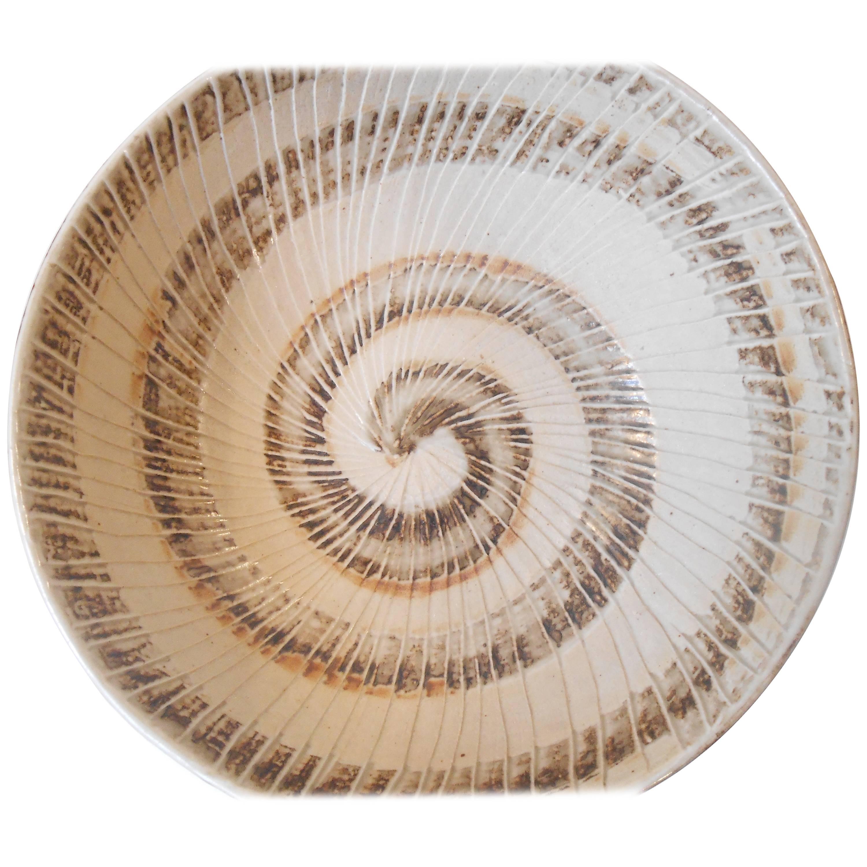 Unique - unika 'Centerpiece' bowl designed by Gerd Bogelund and manufactured under license for Royal Copenhagen, Denmark. Earthy pastel glazes, incised spiral motif' composes the interior of the bowl. The exterior displays his distinct approach