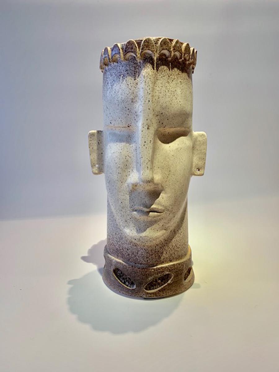 Monumental modern/contemporary ceramic sculpture artisan vase - the vase is comprised out of ceramic and features a detailed chiseled men’s face. Attention to detail is shown throughout the vase, face, hair to pierced ears.