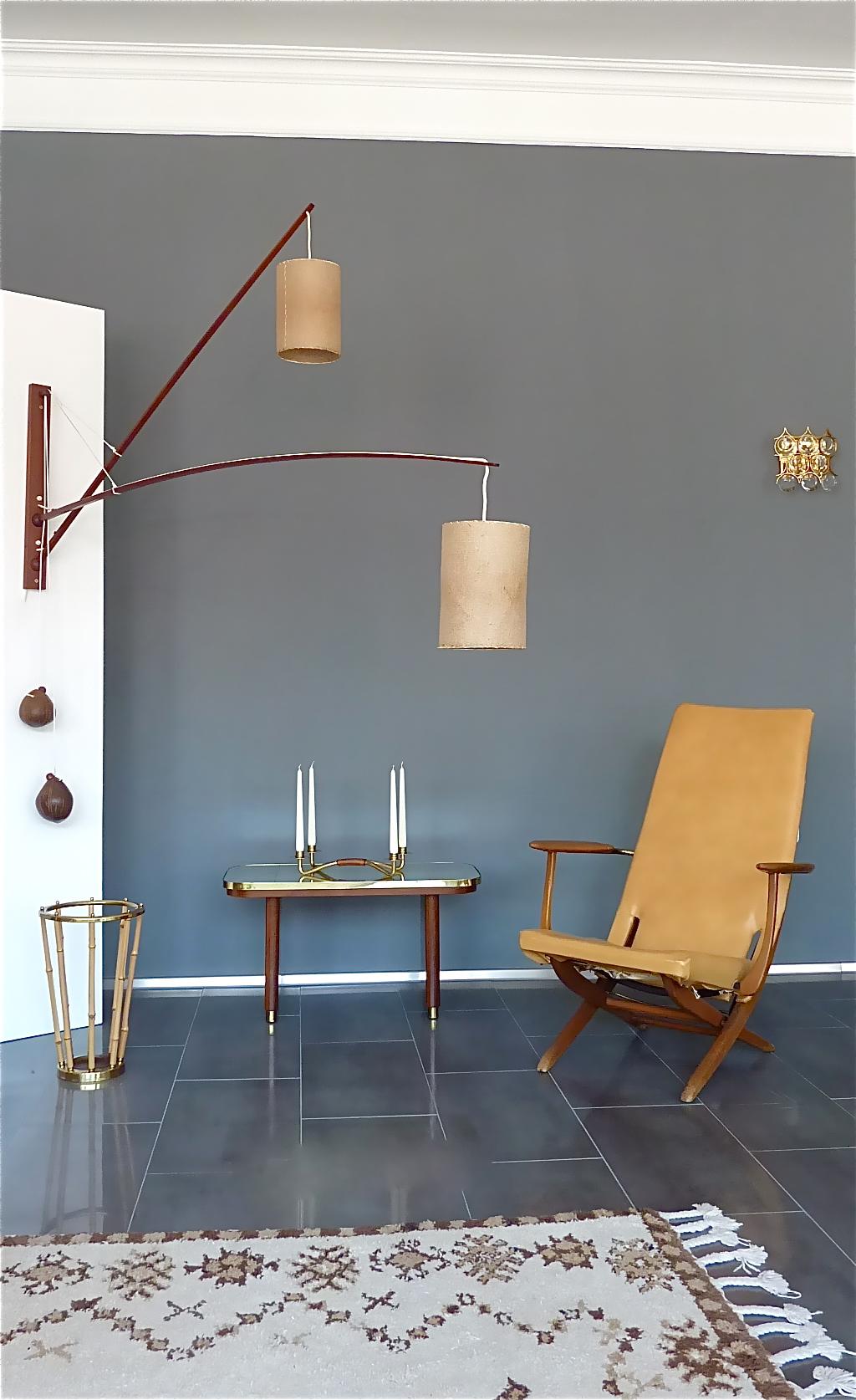Monumental and super rare solid teak double wall light by Rupprecht Skrip, Germany circa 1950s-1960s. Very refined and adjustable midcentury wall lamp which has a solid teak base, two ball-joints with two teak rods of different length, original