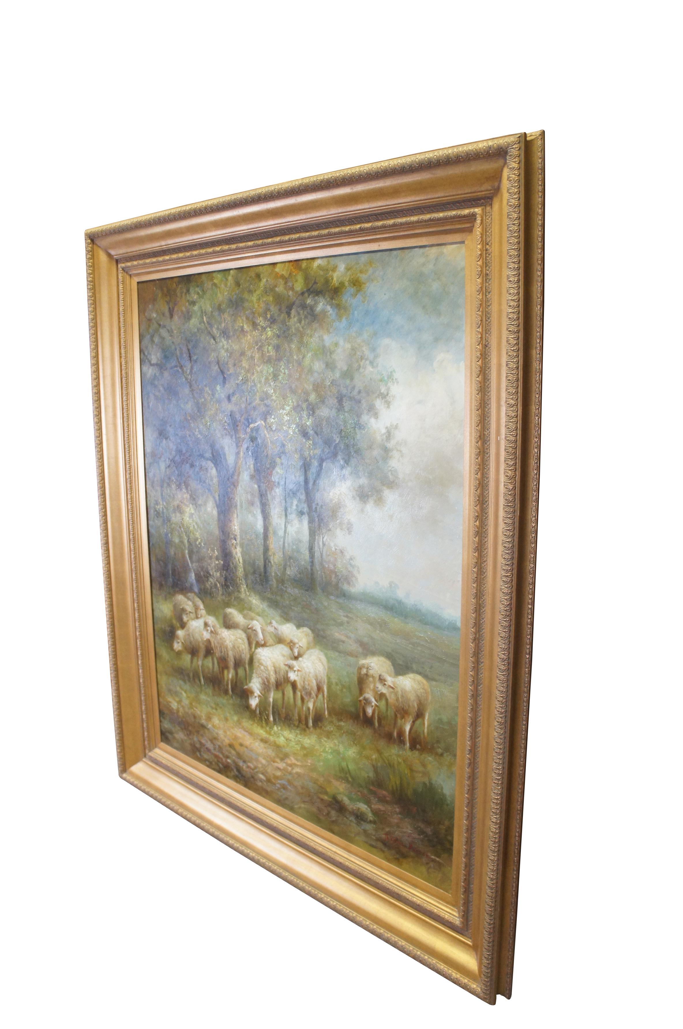 A very large and impressive vintage Thomas Barron oil painting on canvas featuring a flock of sheep / lamb grazing at the edge of a forest in the countryside.  Framed in elegant gold frame.

Dimensions:
74.5