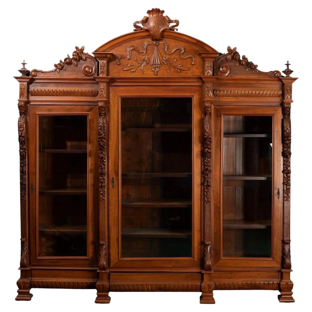 Monumental Three-Door Italian Walnut Bookcase For Sale